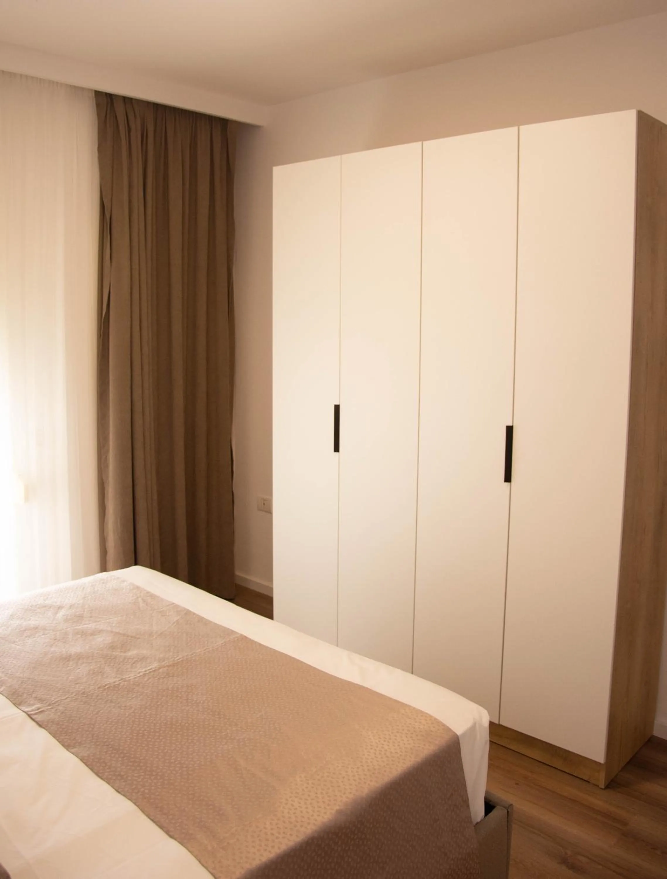 Bed in Wave Beachfront Apartments