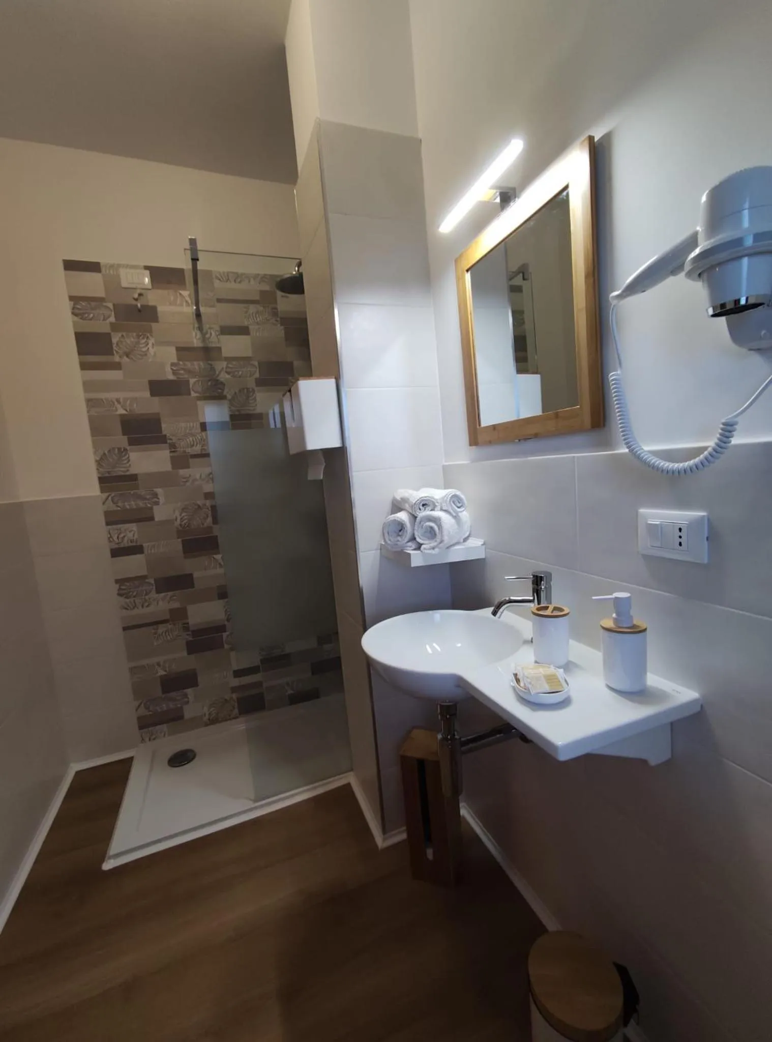 Bathroom in Loremi Rooms