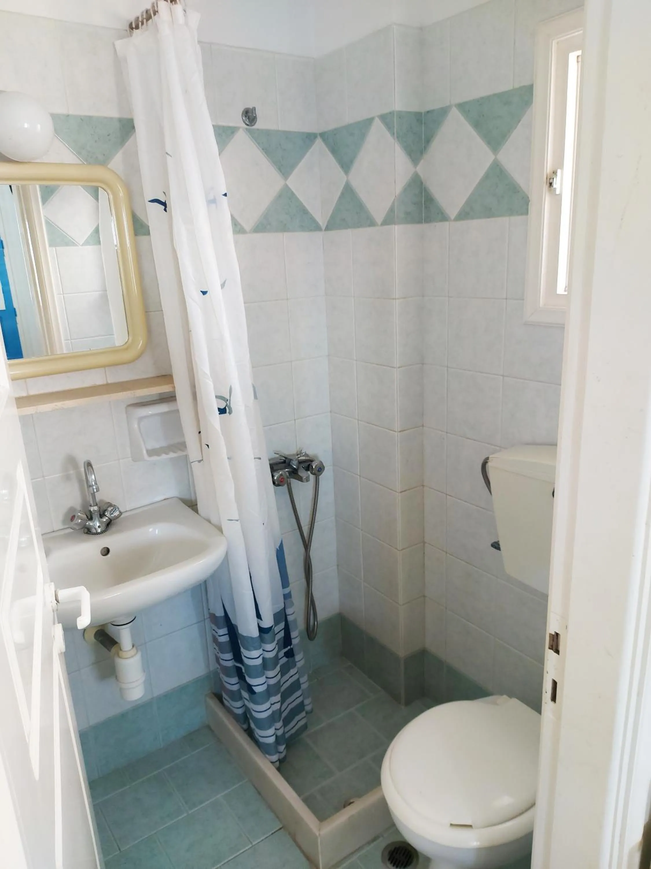Toilet in Aigaio View Studios & Rooms