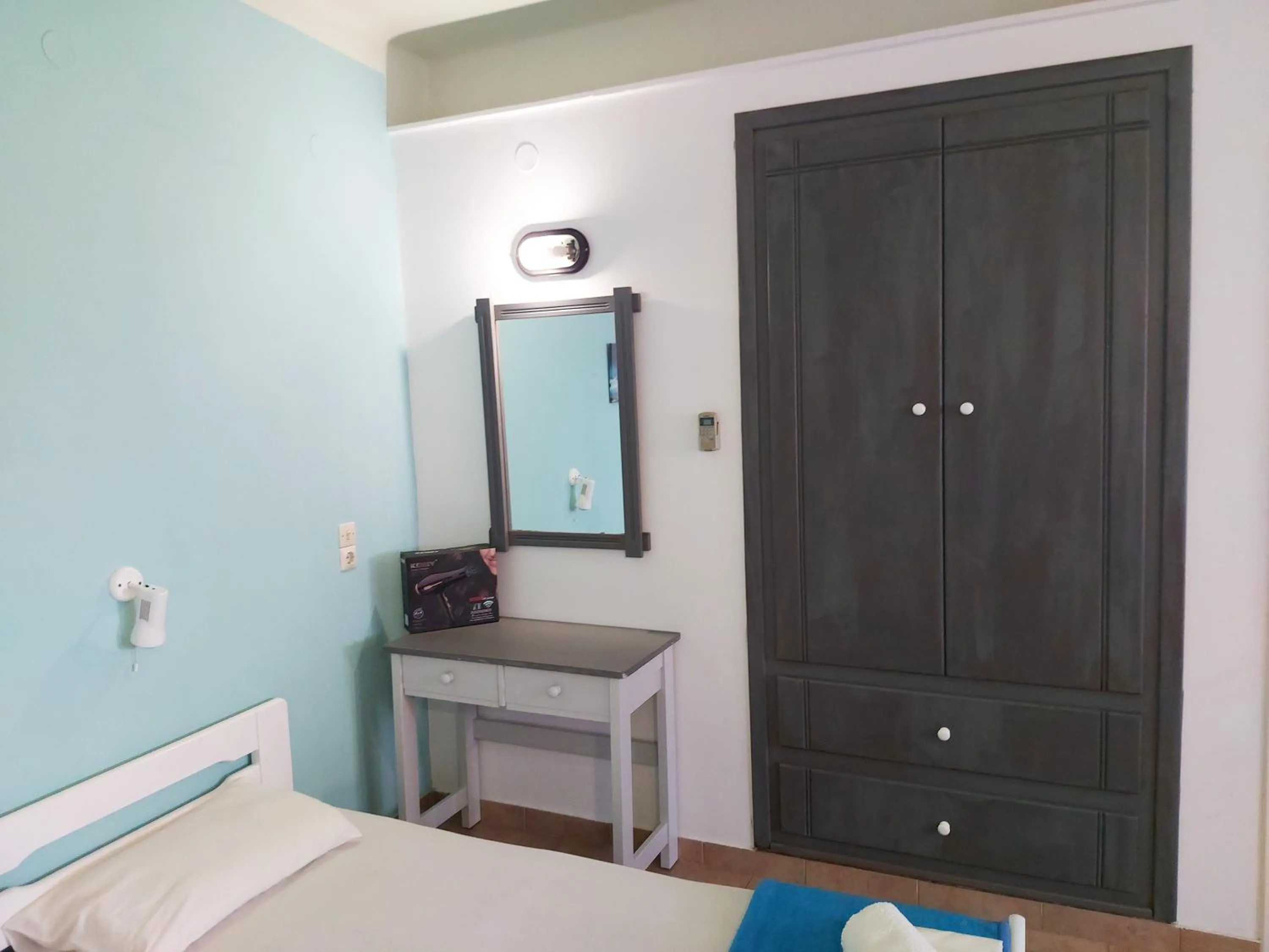 Bed in Aigaio View Studios & Rooms