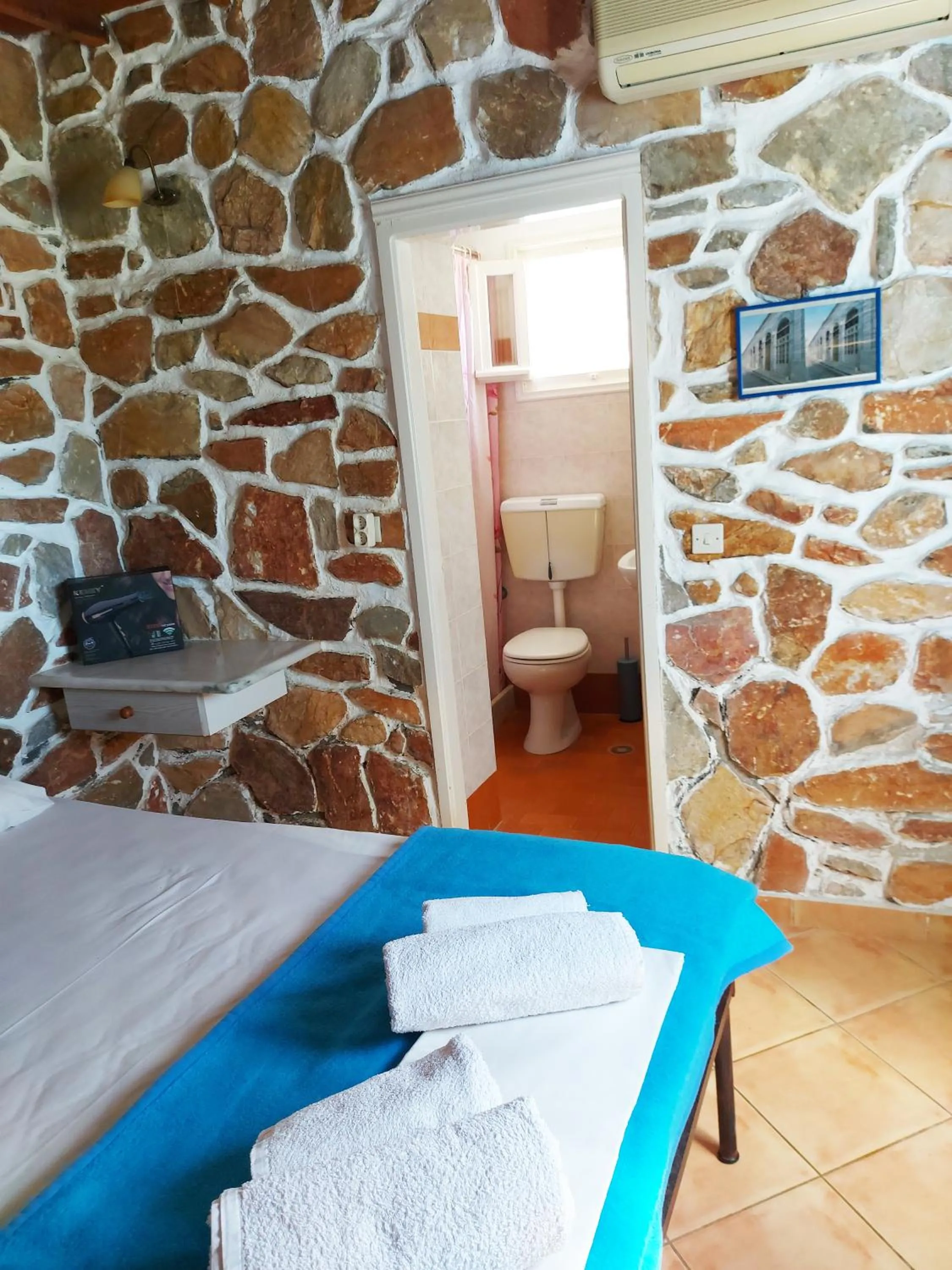 Toilet, Bed in Aigaio View Studios & Rooms