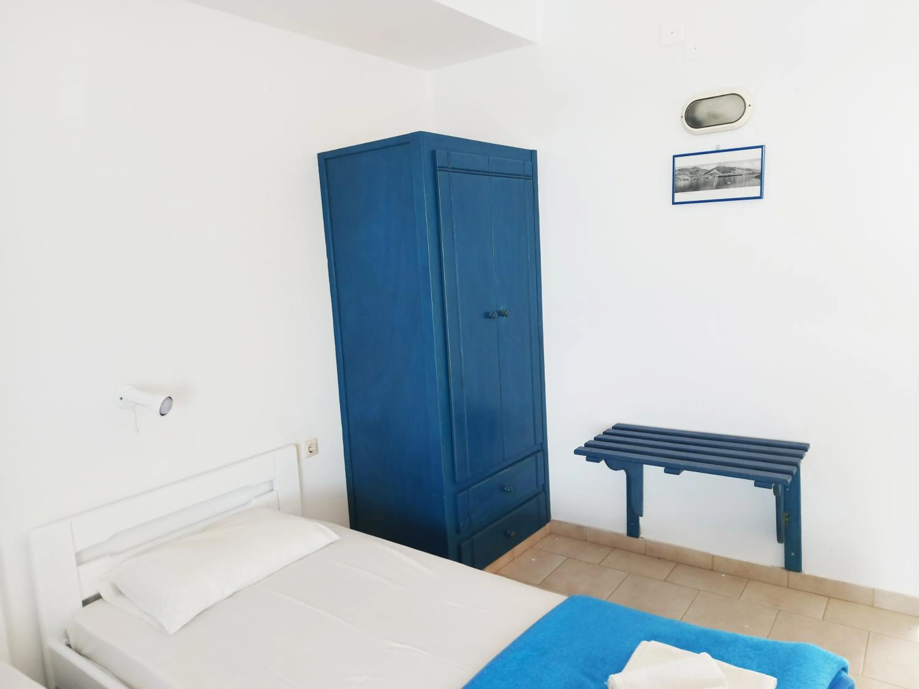Bed in Aigaio View Studios & Rooms