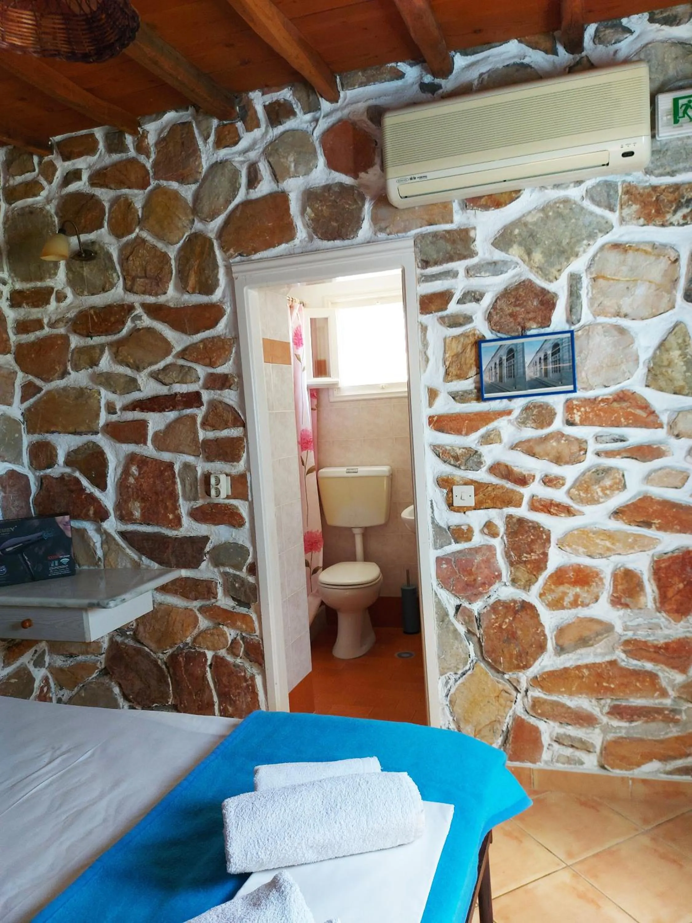 Toilet, Bed in Aigaio View Studios & Rooms
