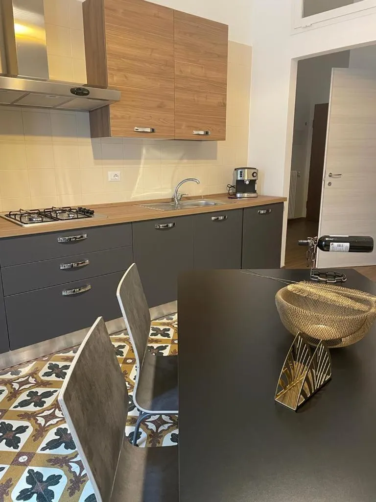 Kitchen or kitchenette in Maioliche Apartment