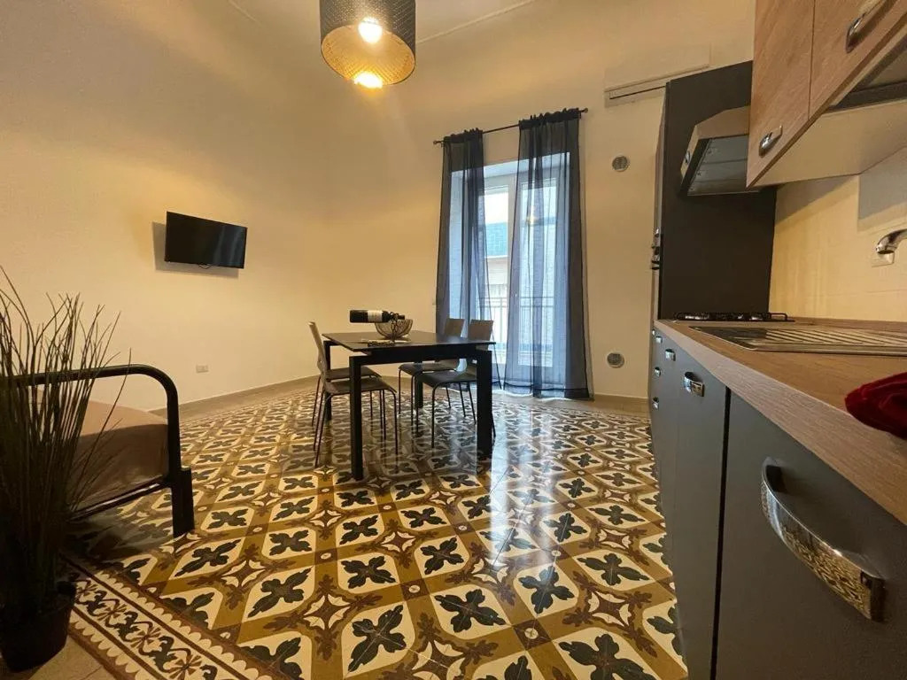 Kitchen or kitchenette in Maioliche Apartment