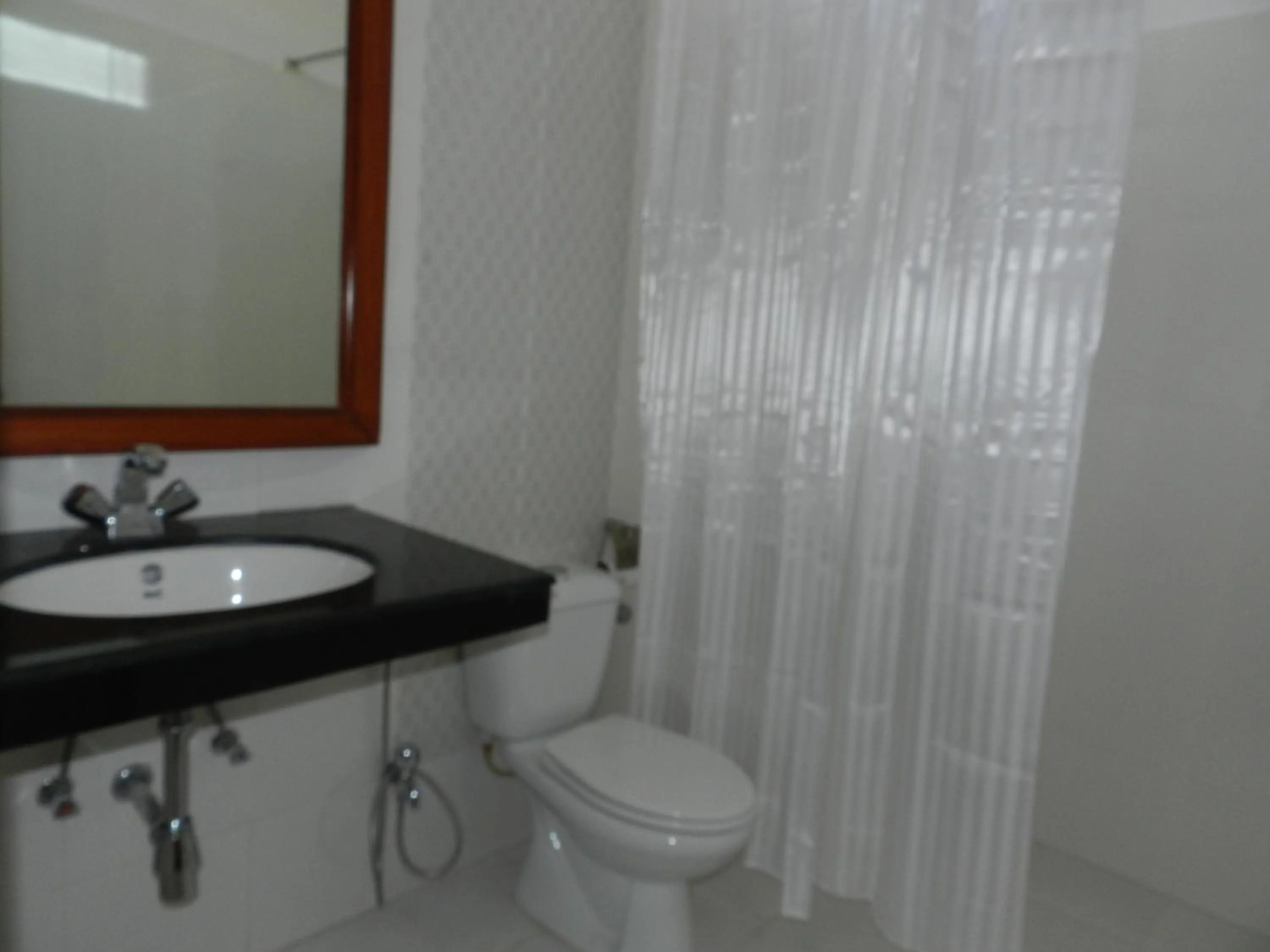 Toilet in Euro Star Inn