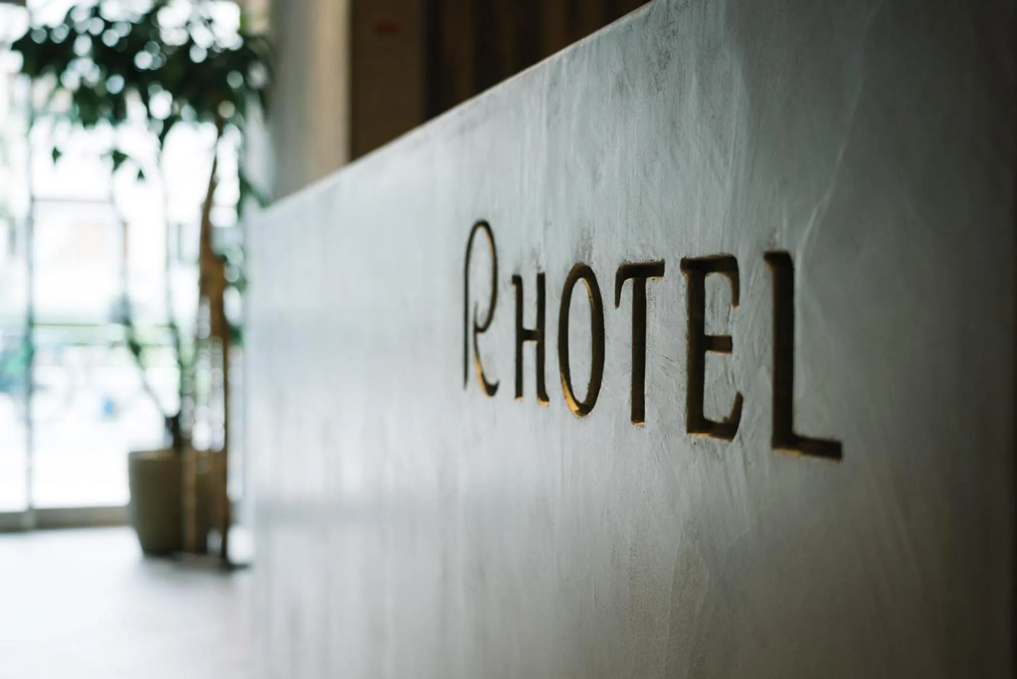 Property logo or sign in R Hotel Namba South