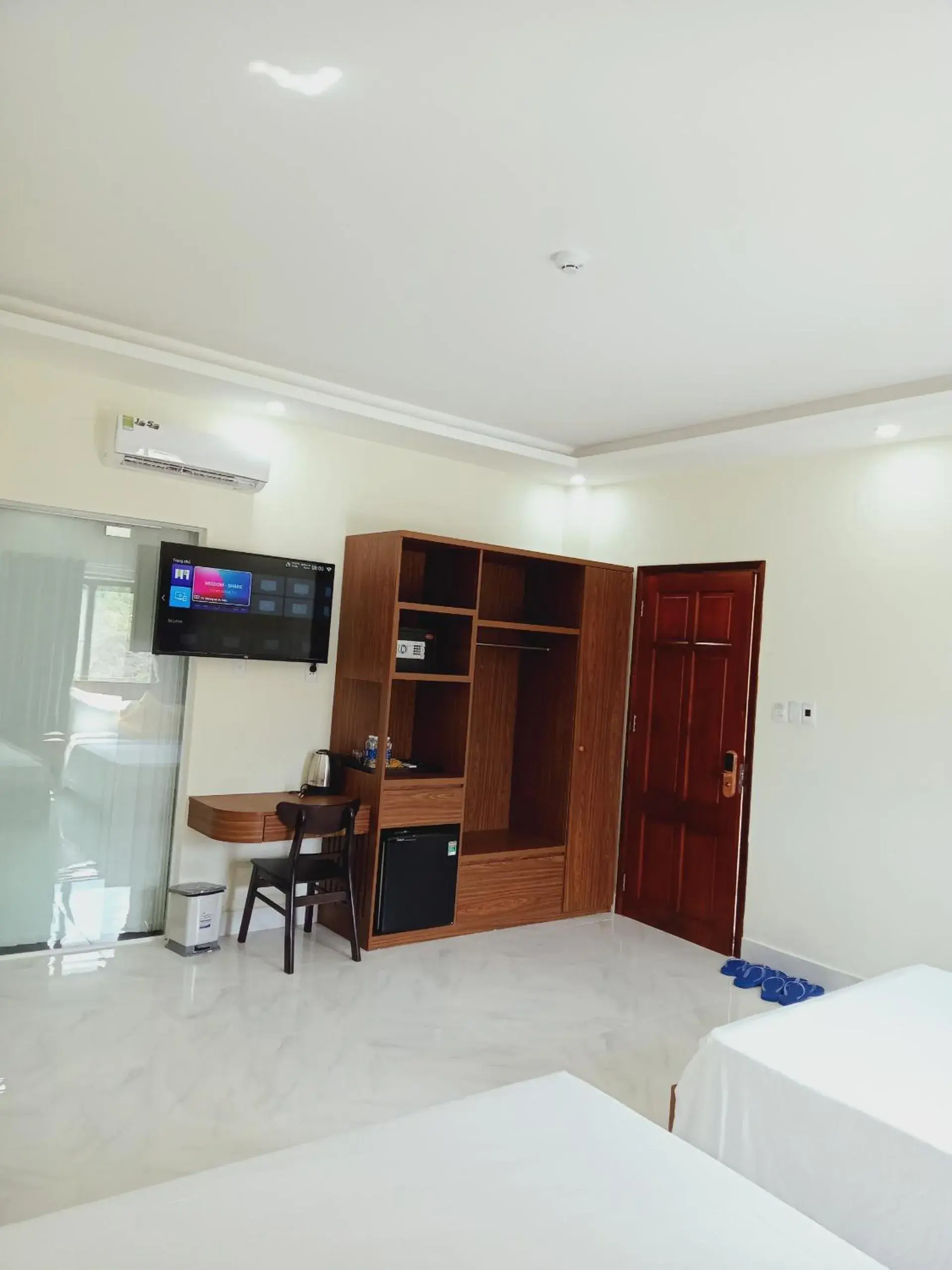 TV and multimedia, Bed in Hoàng Anh Côn Đảo Hotel TV and multimedia, Bed in Hoàng Anh Côn Đảo Hotel