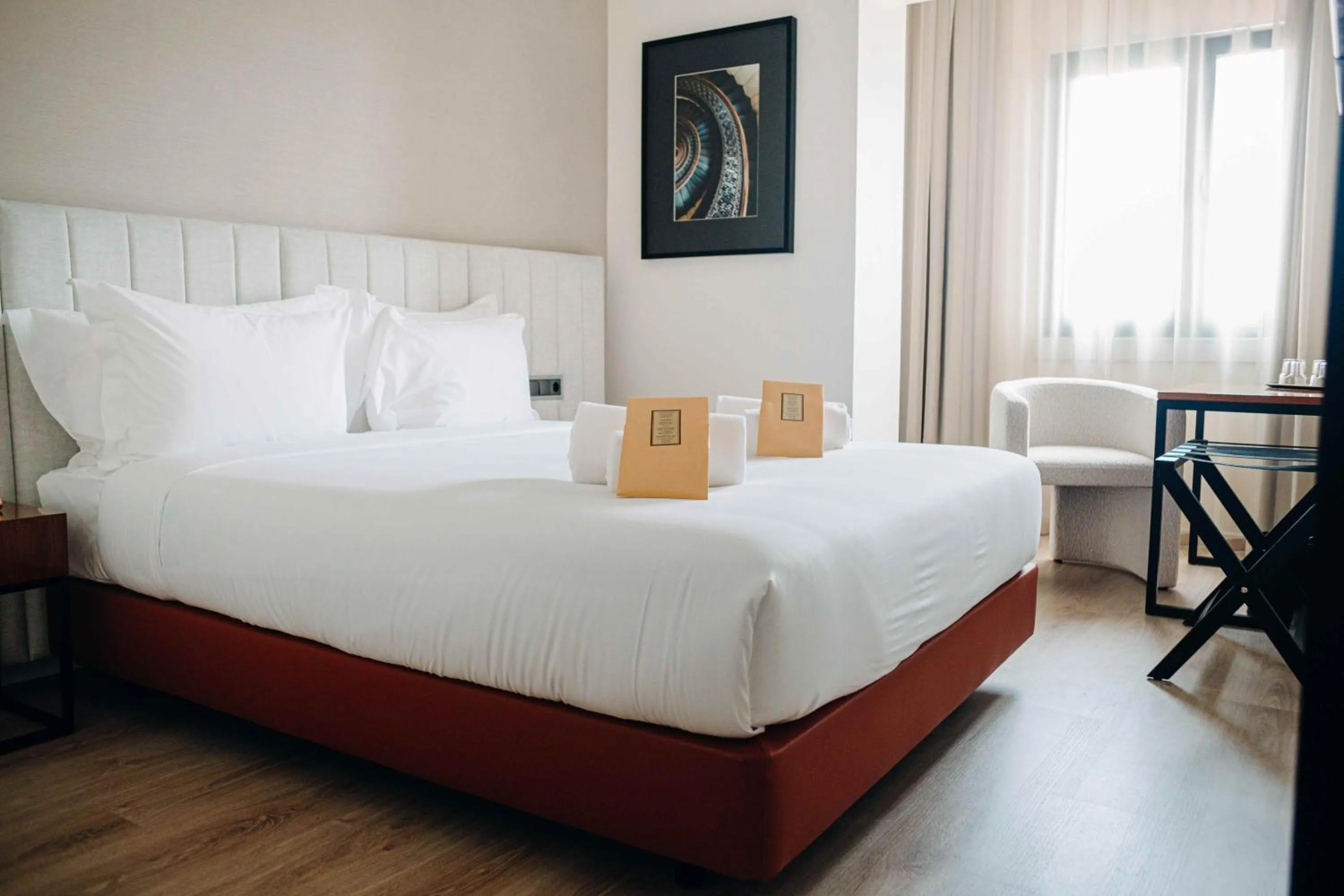Bed in Next Level Premium Hotels