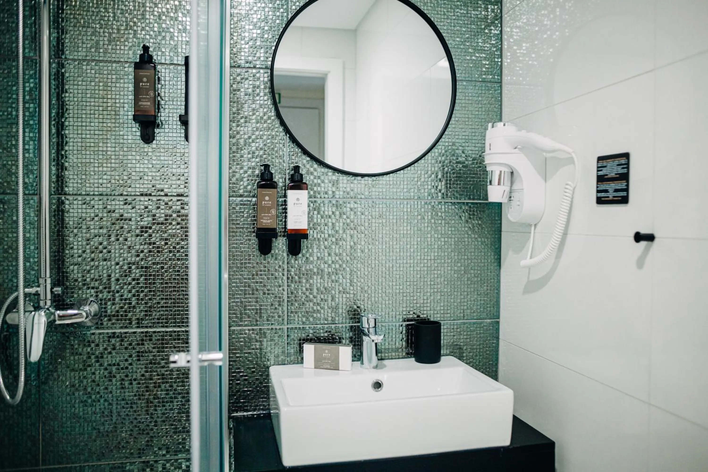 Bathroom in Next Level Premium Hotels