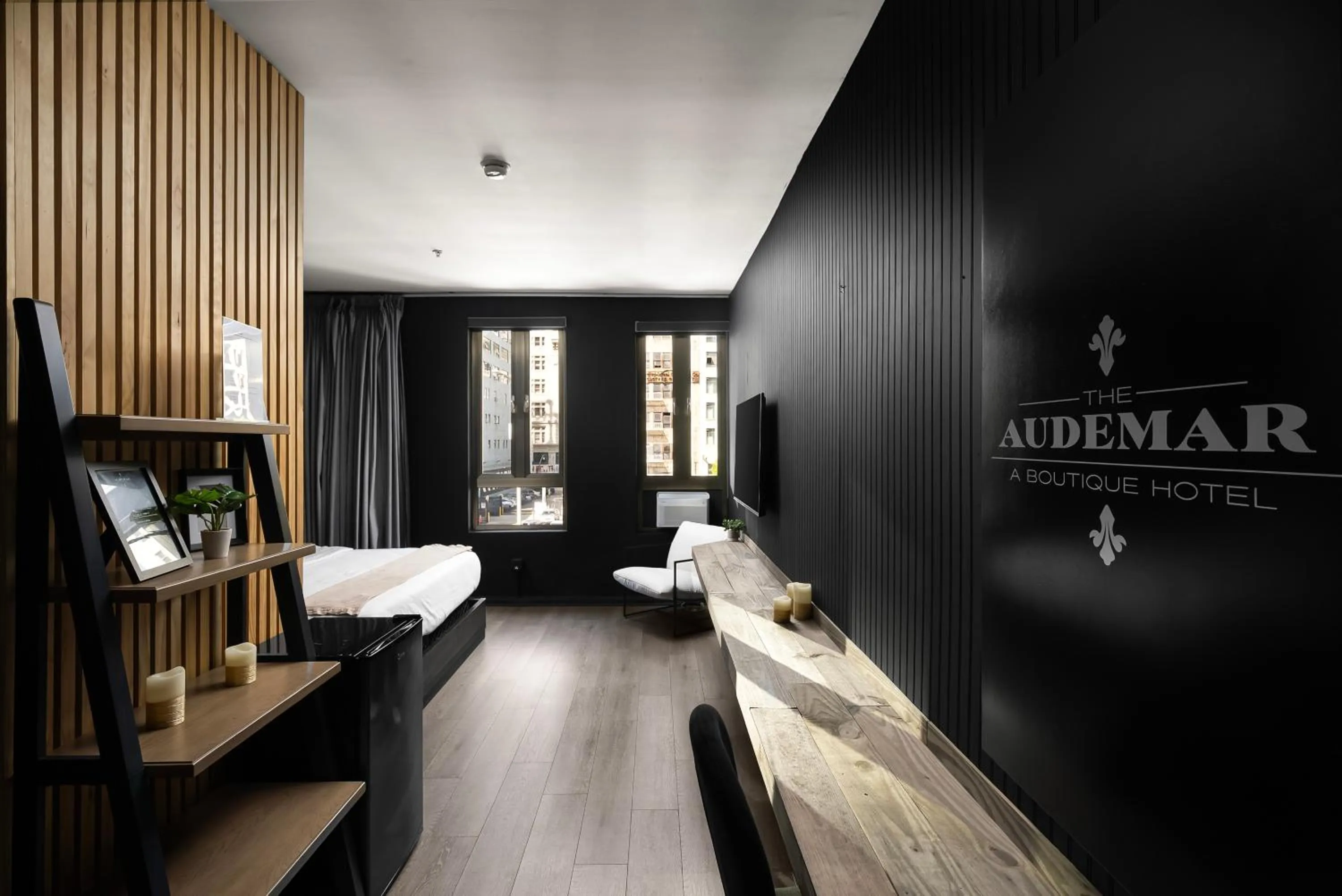 Bed in Audemar Boutique Hotel and Apartment Homes