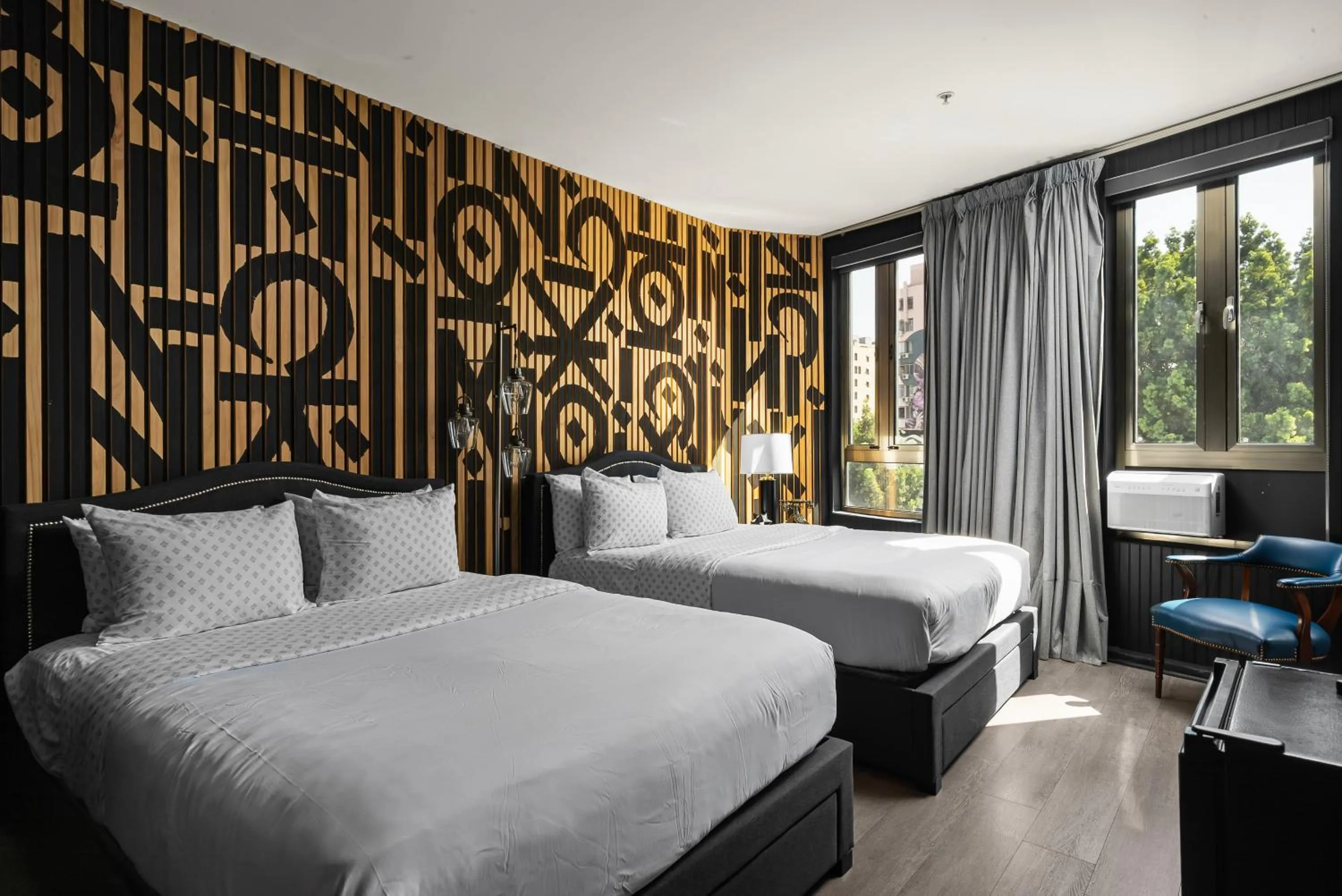 Bed in Audemar Boutique Hotel and Apartment Homes