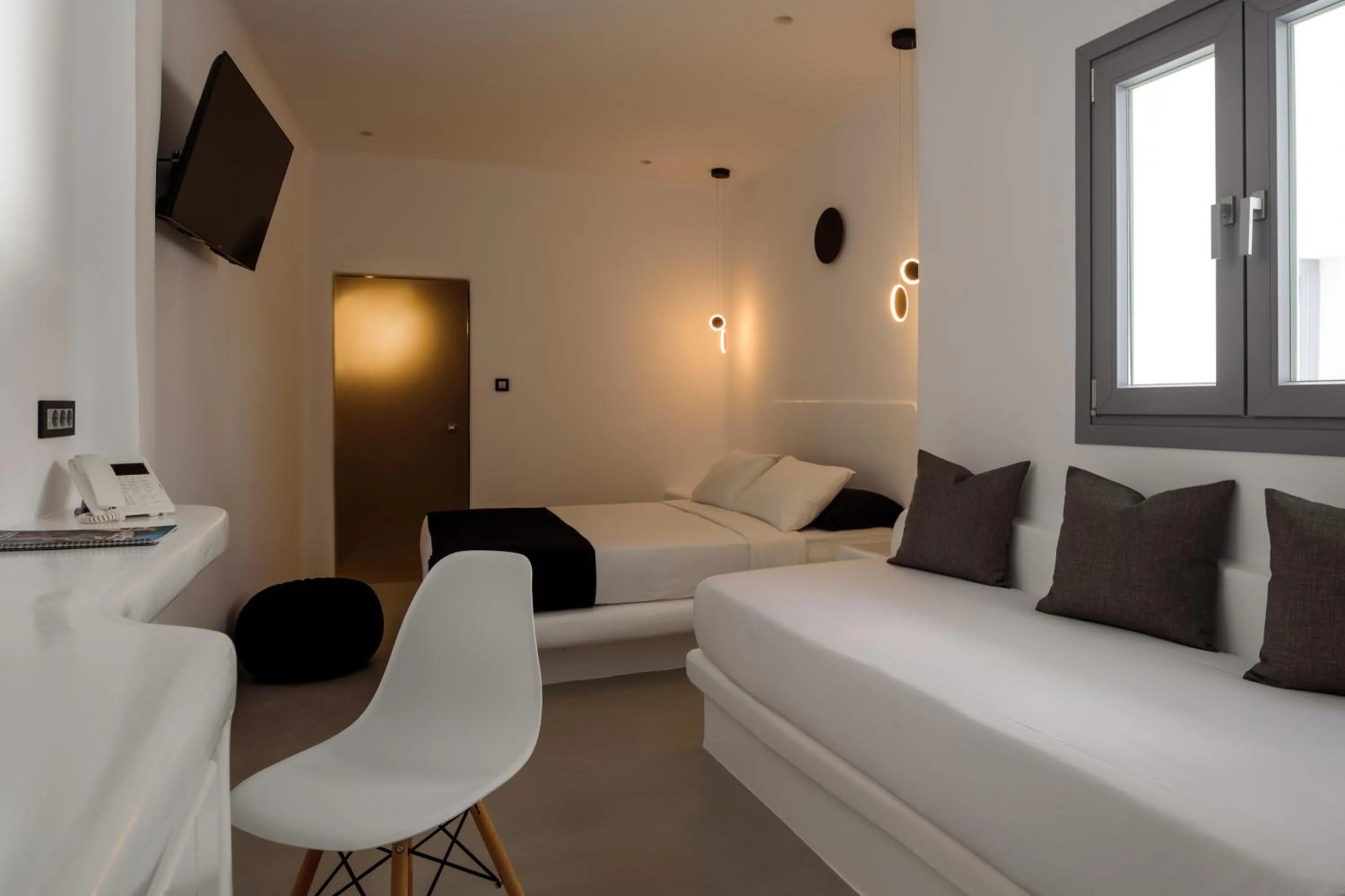 Bed in Tataki Family Hotel