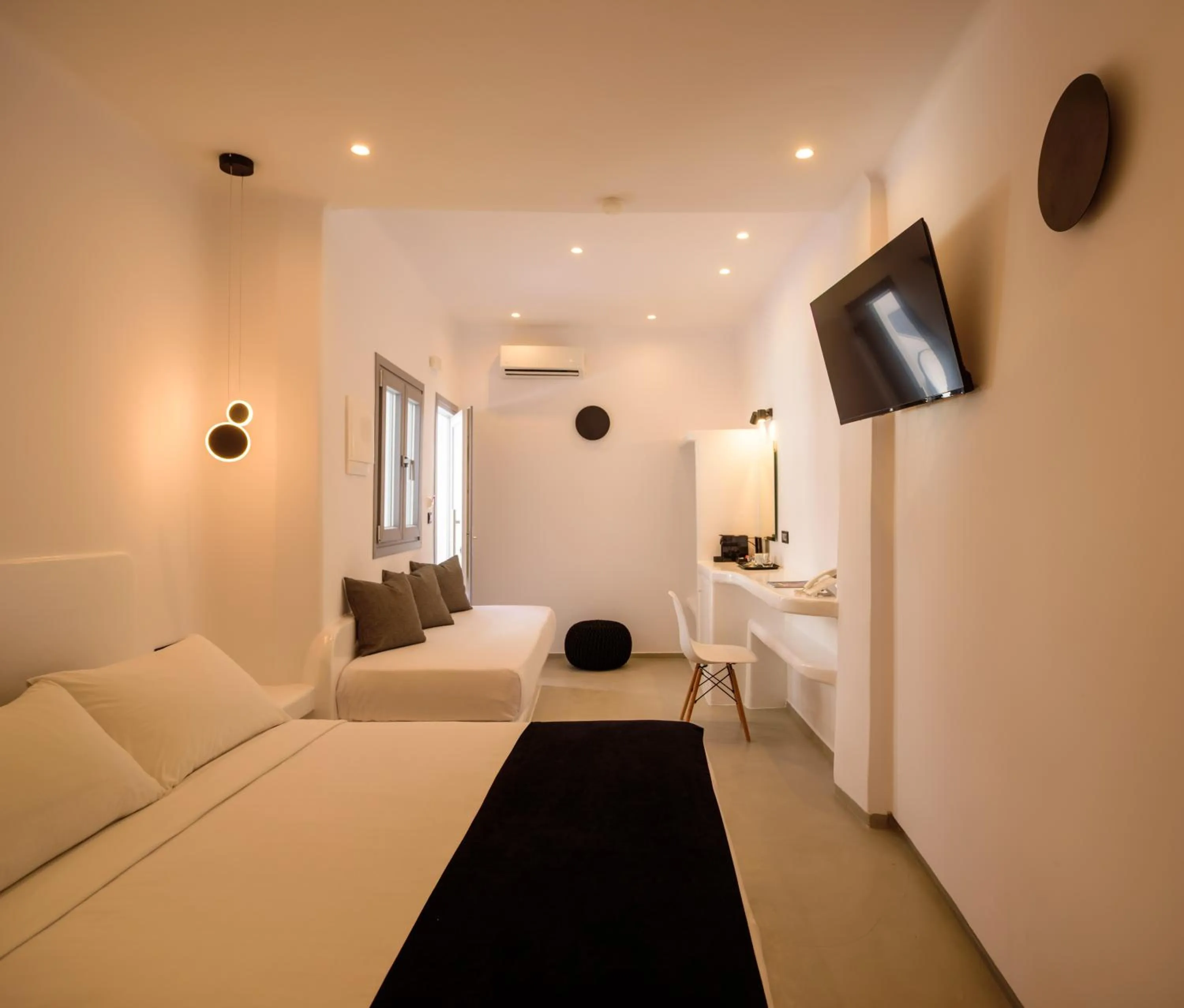 Bed in Tataki Family Hotel