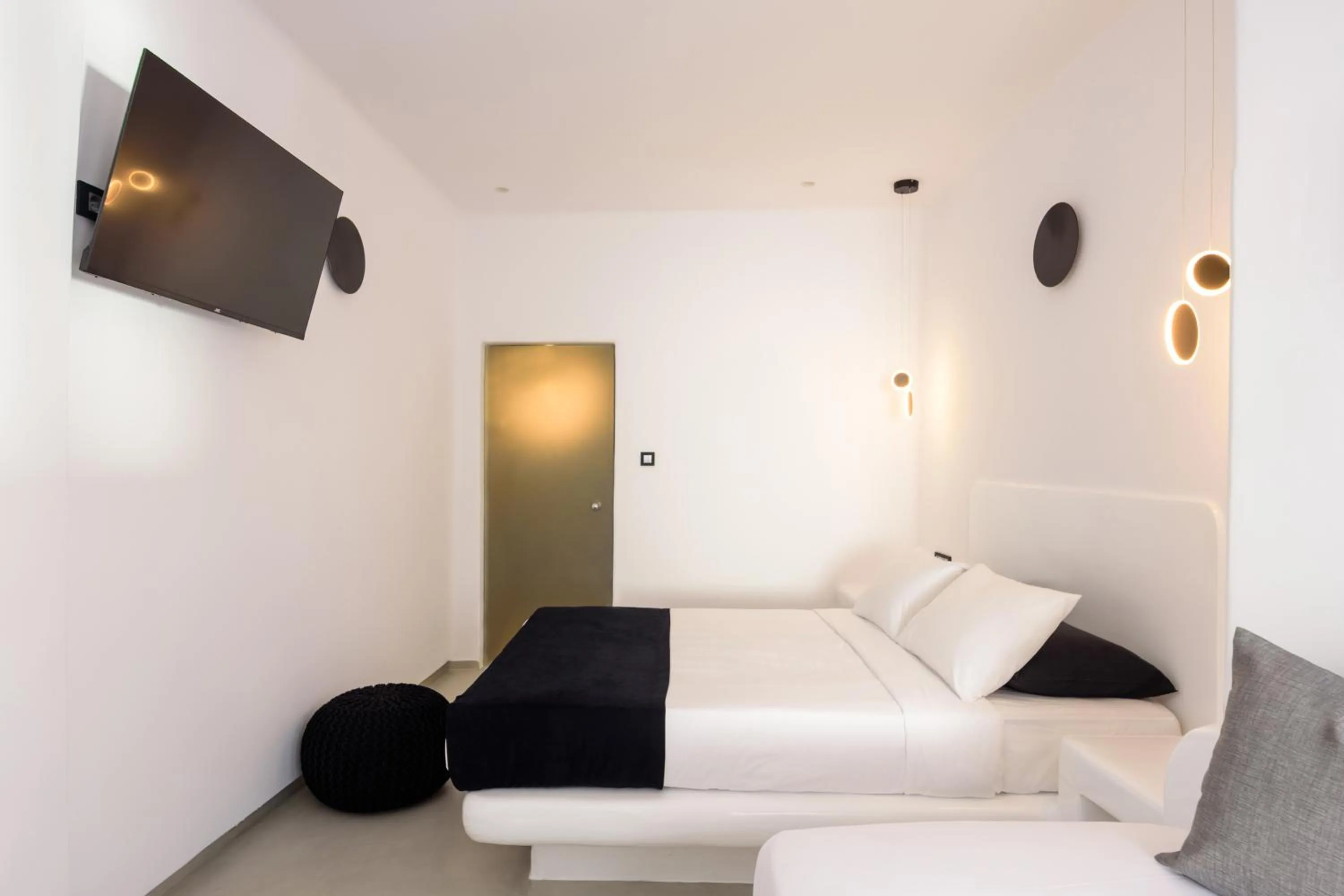 Bed in Tataki Family Hotel