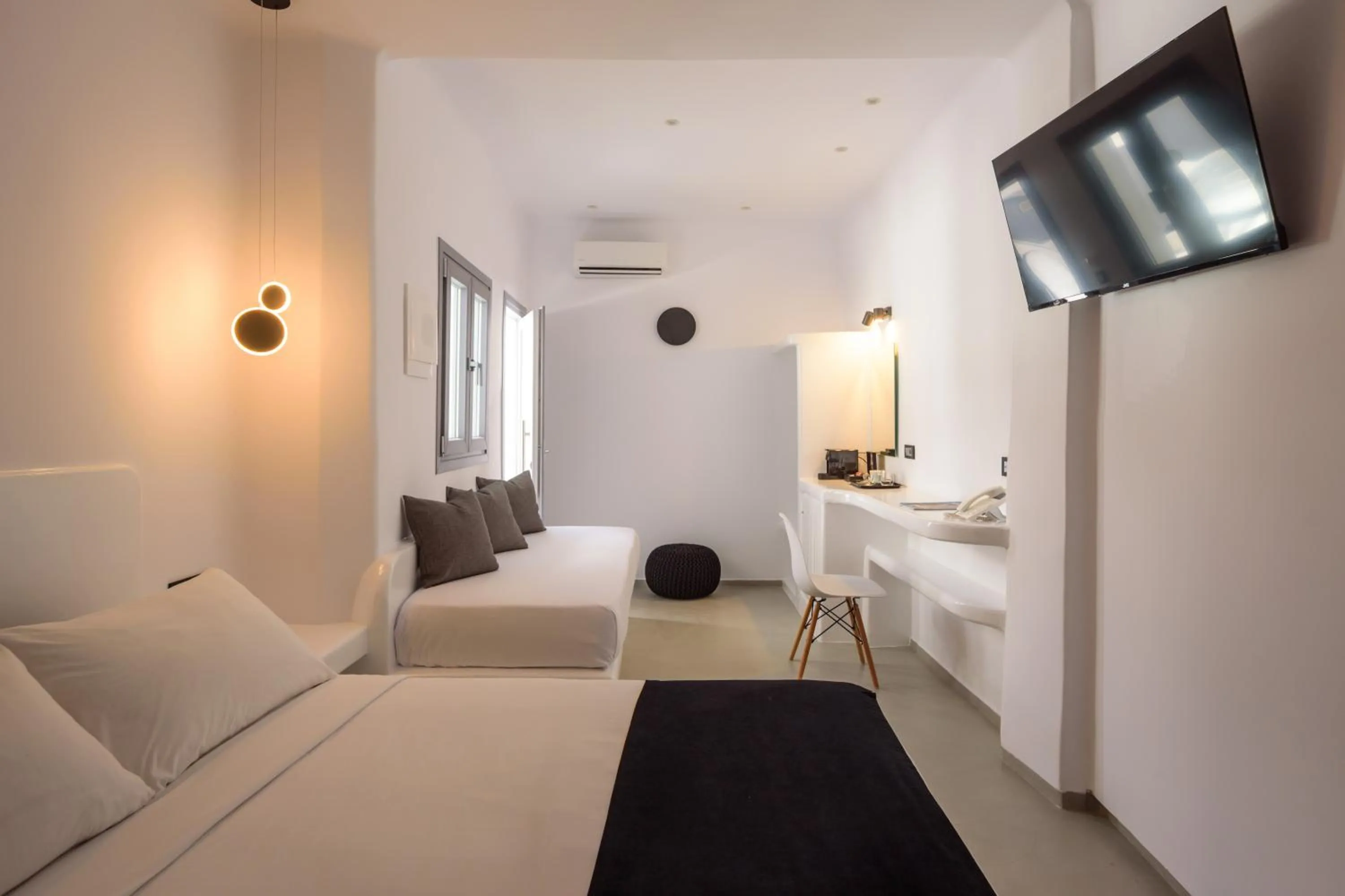 Bed in Tataki Family Hotel