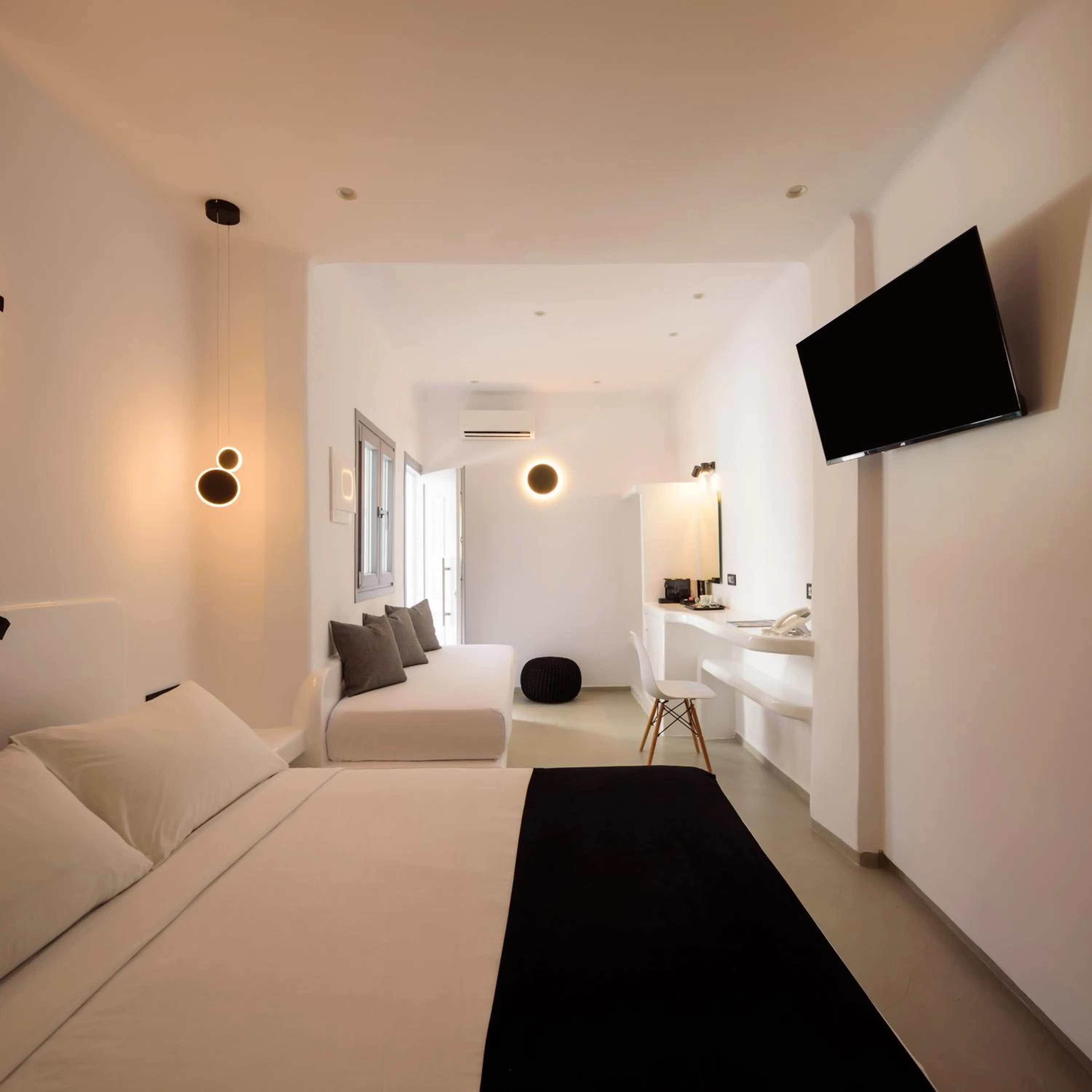 Bed in Tataki Family Hotel