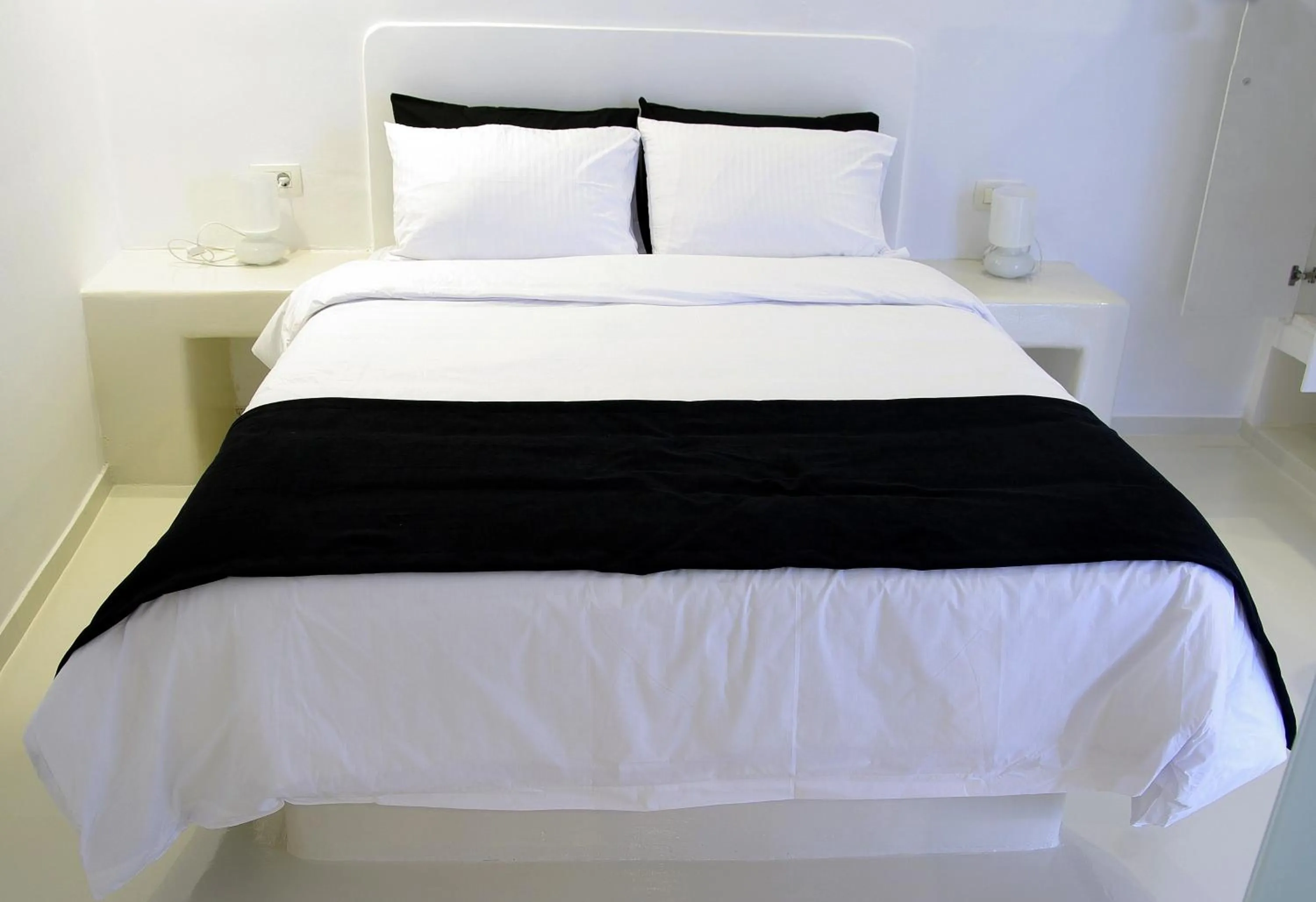 Bed in Tataki Family Hotel