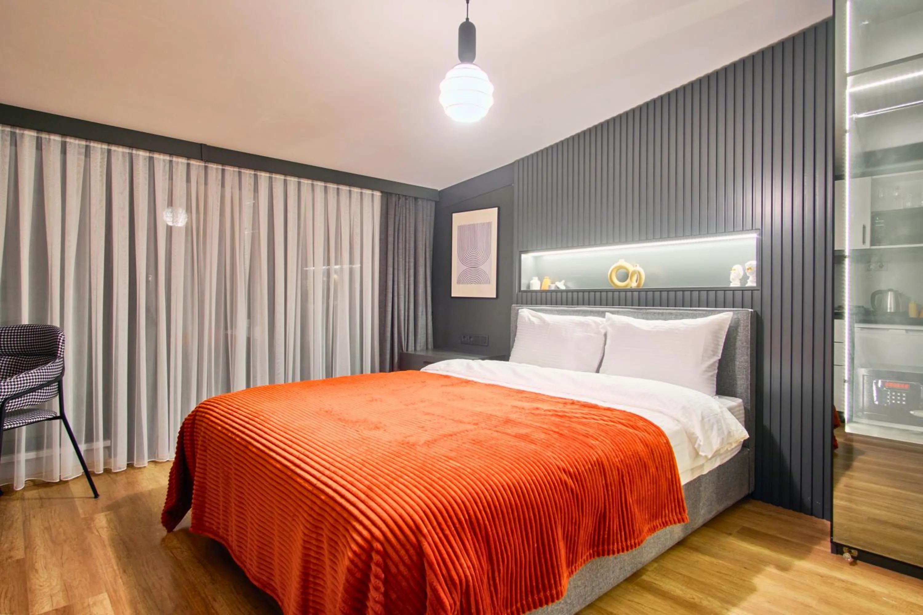 Bed in TAKS-INN Hotel