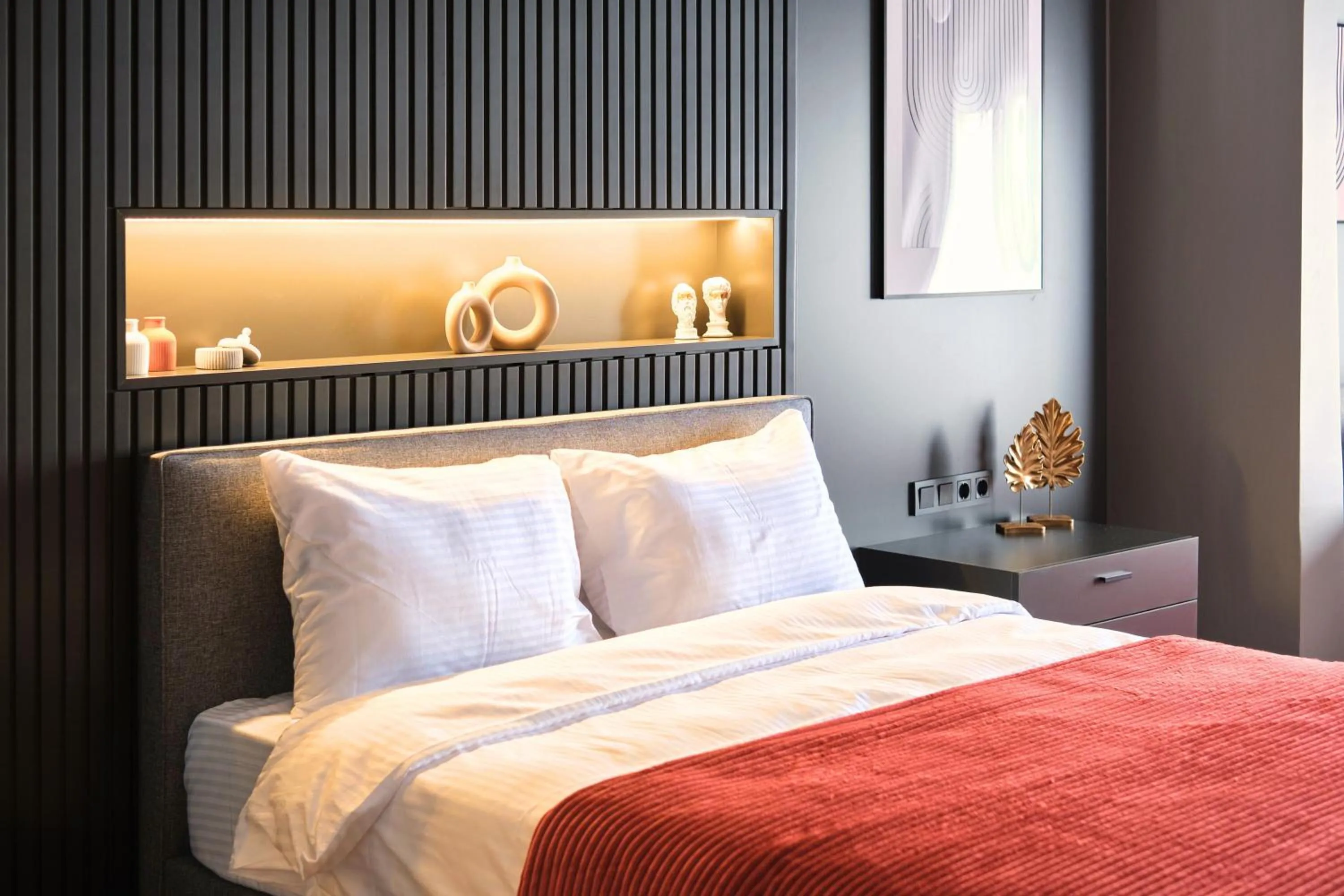 Bed in TAKS-INN Hotel