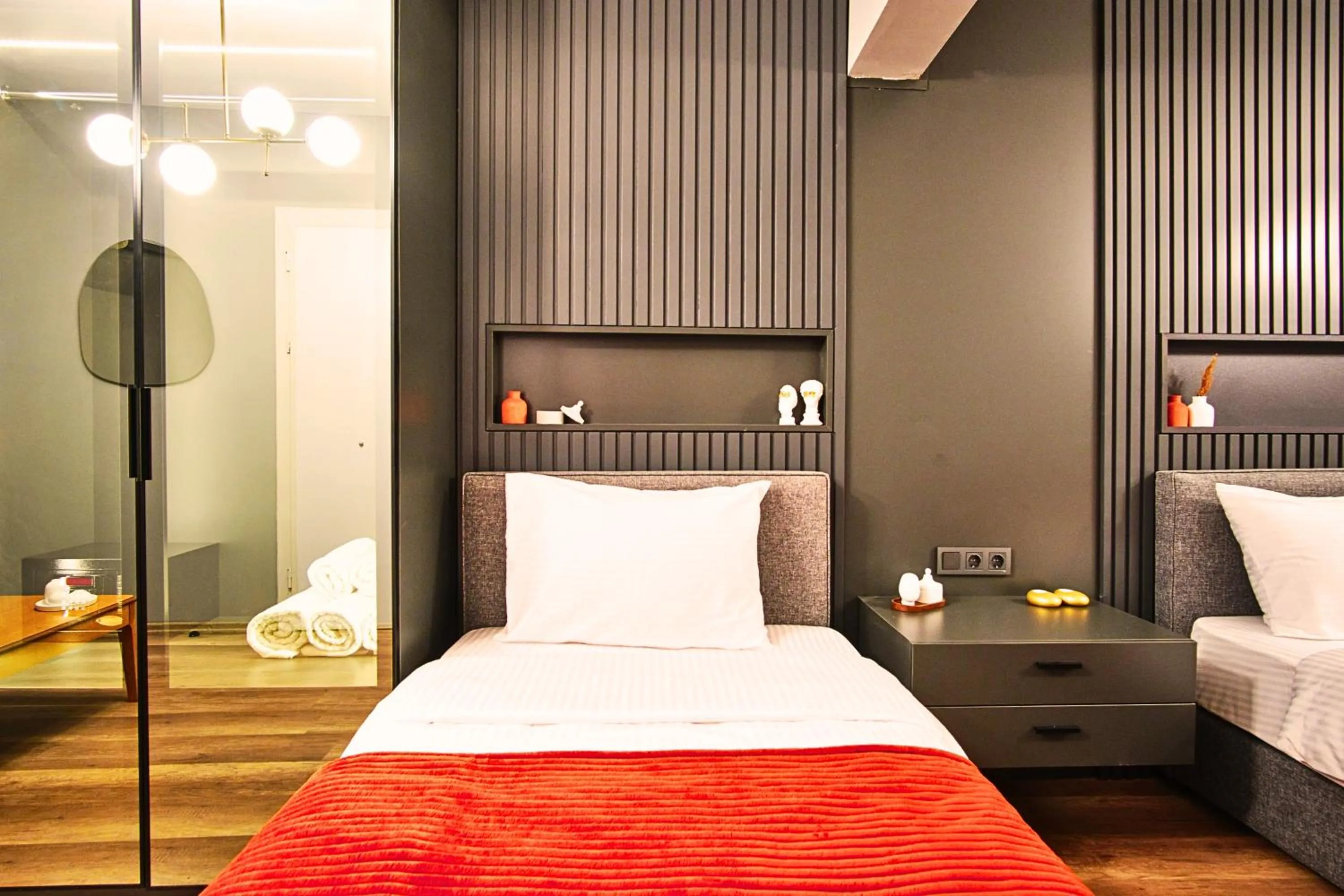 Bed in TAKS-INN Hotel