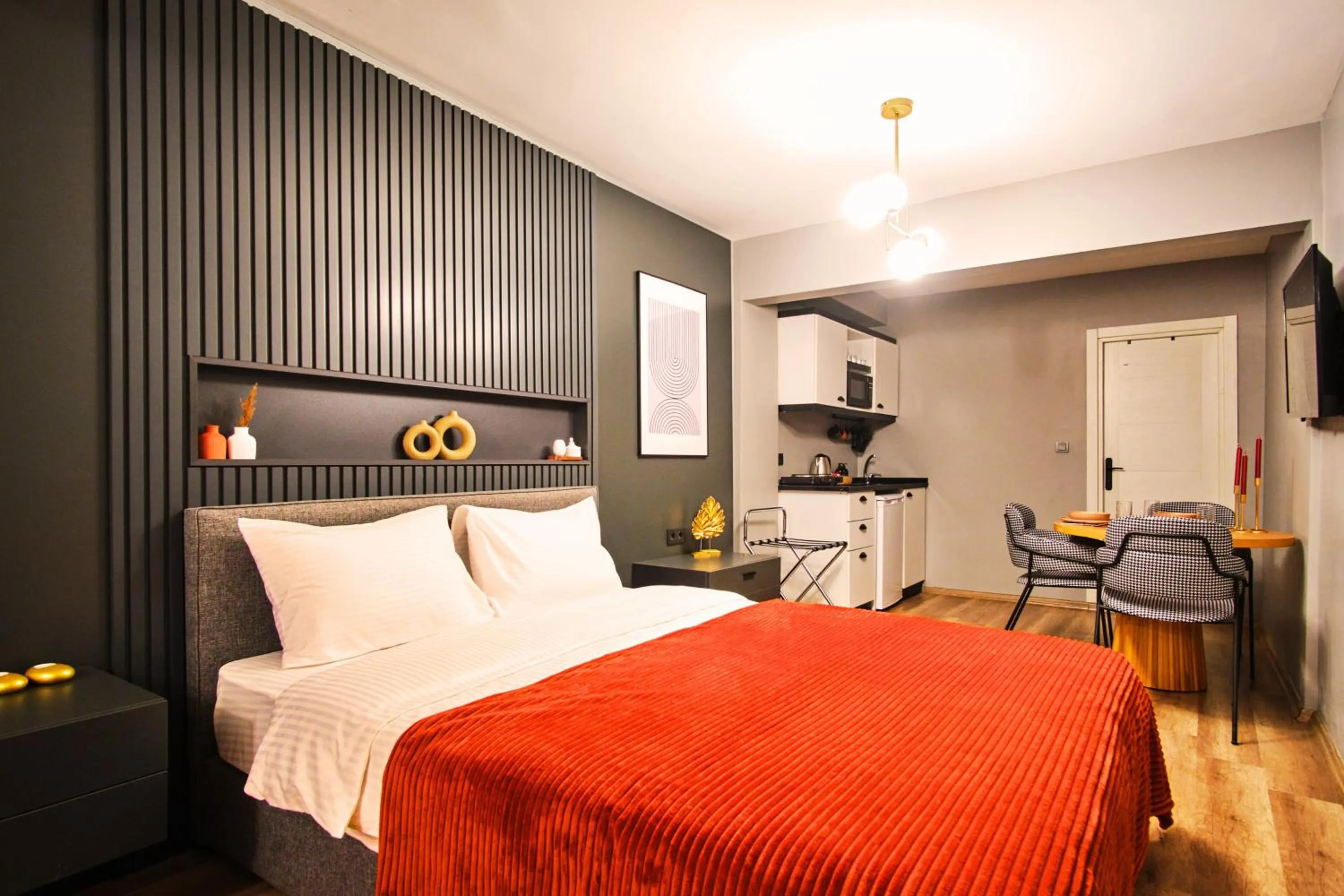 Bed in TAKS-INN Hotel