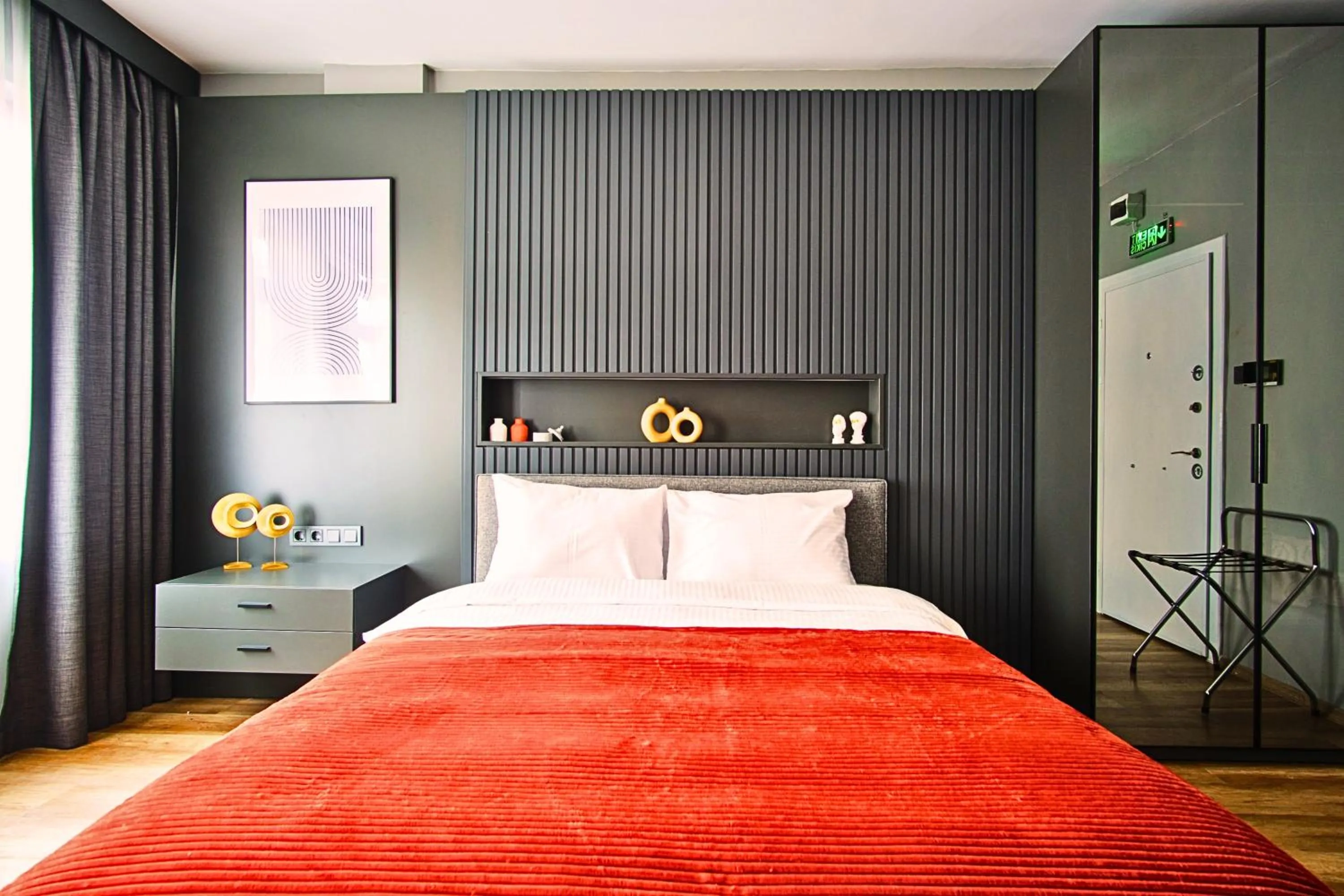 Bed in TAKS-INN Hotel