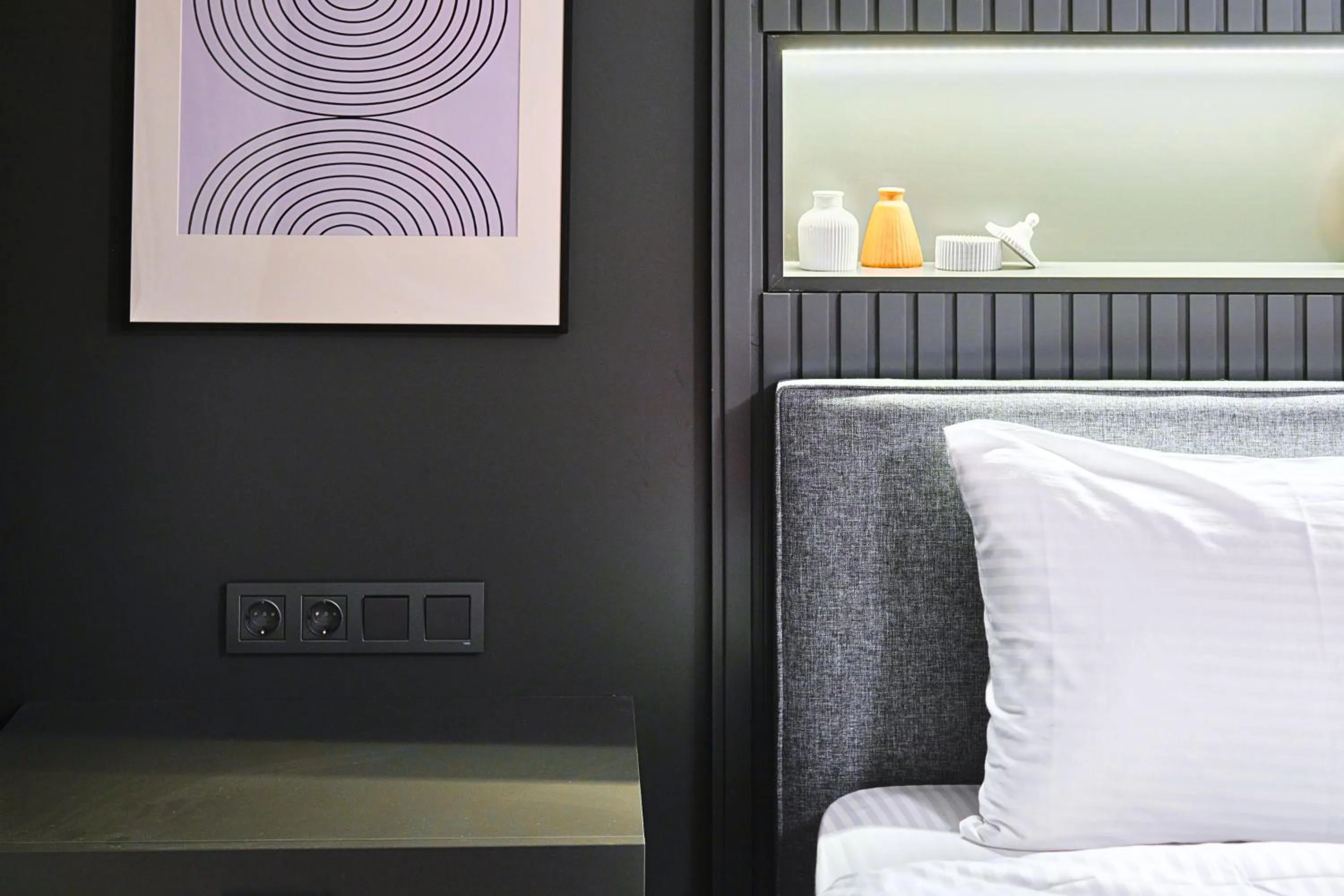 Bed in TAKS-INN Hotel