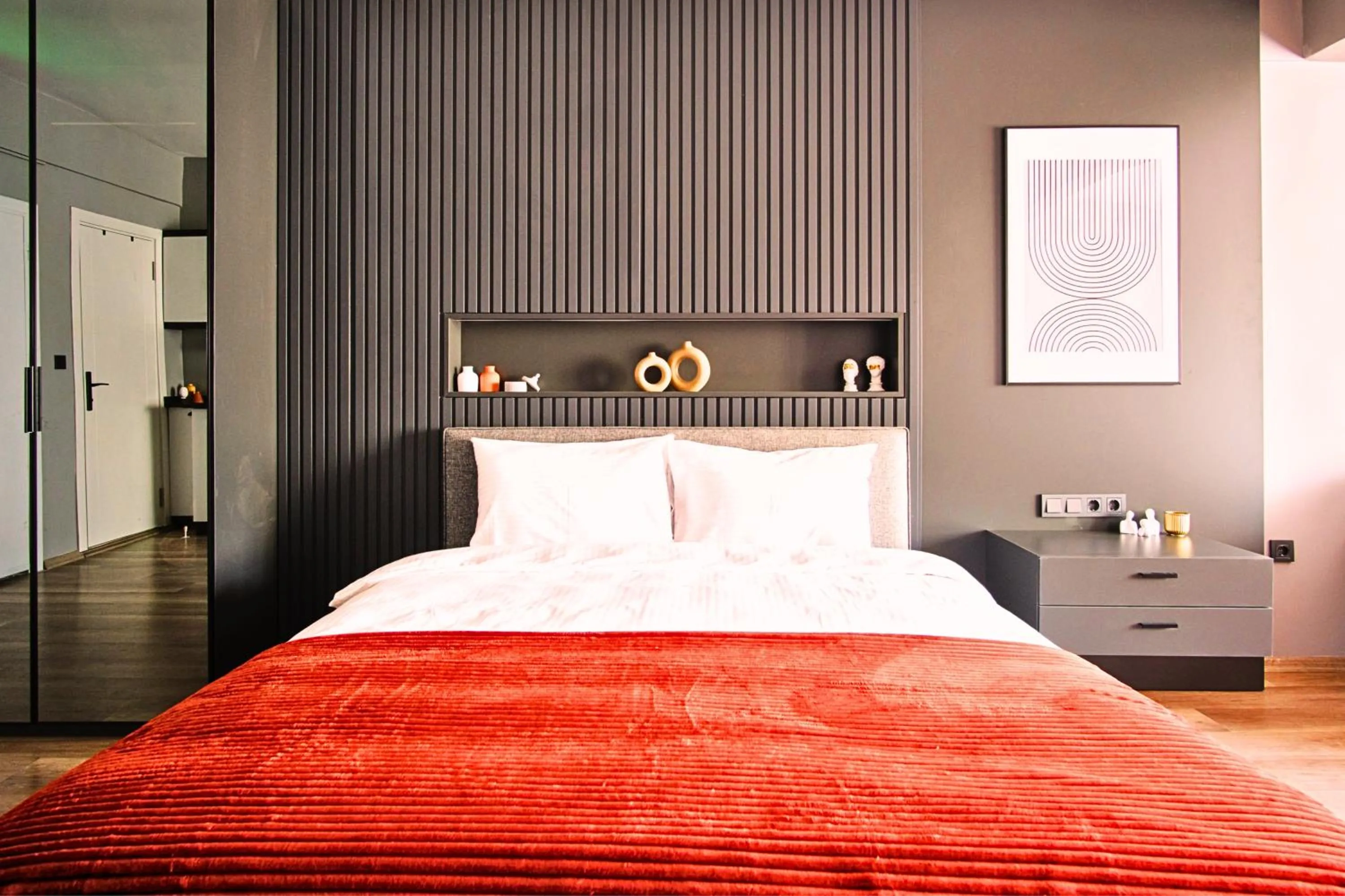 Bed in TAKS-INN Hotel