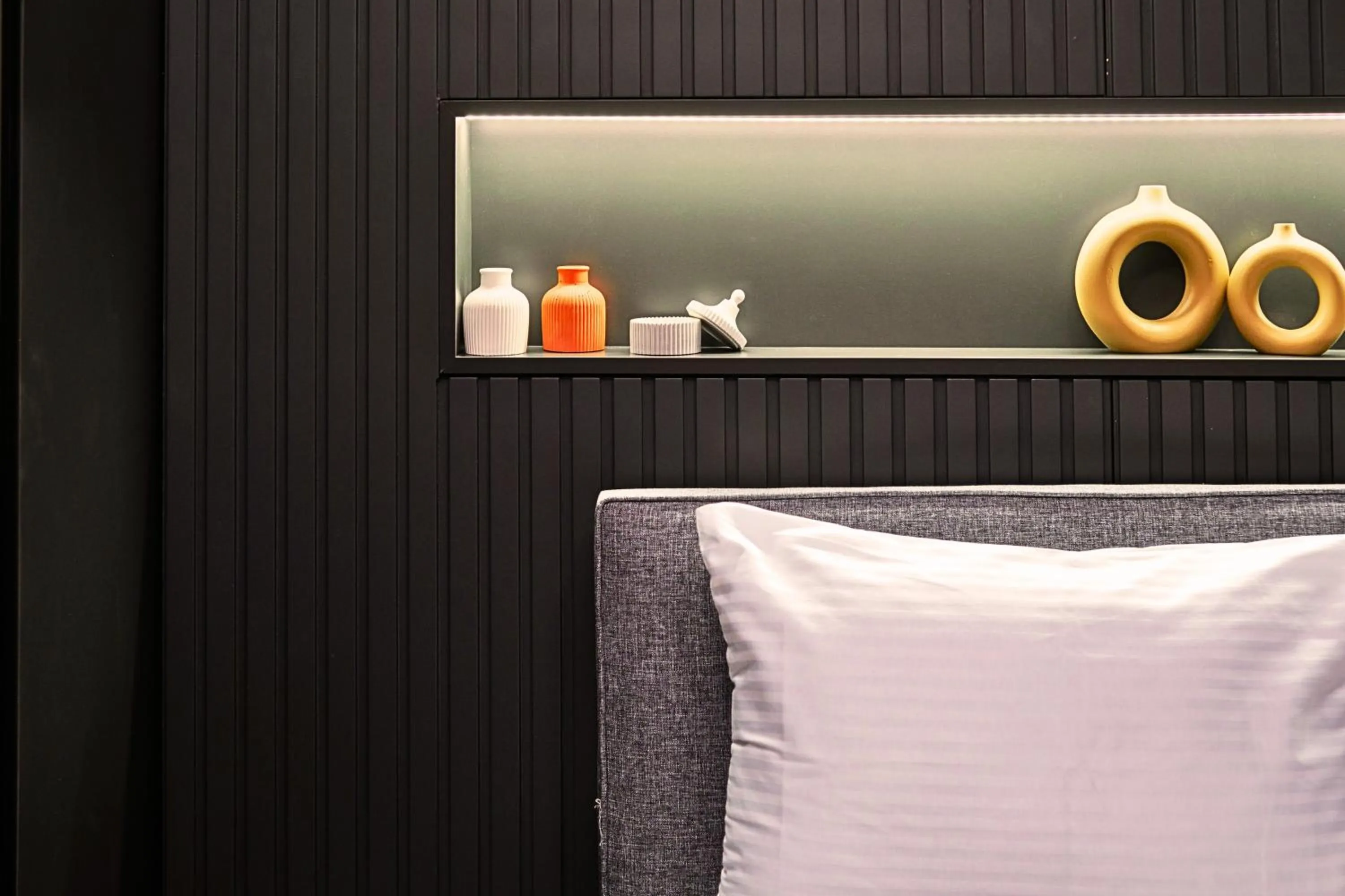 Bed in TAKS-INN Hotel