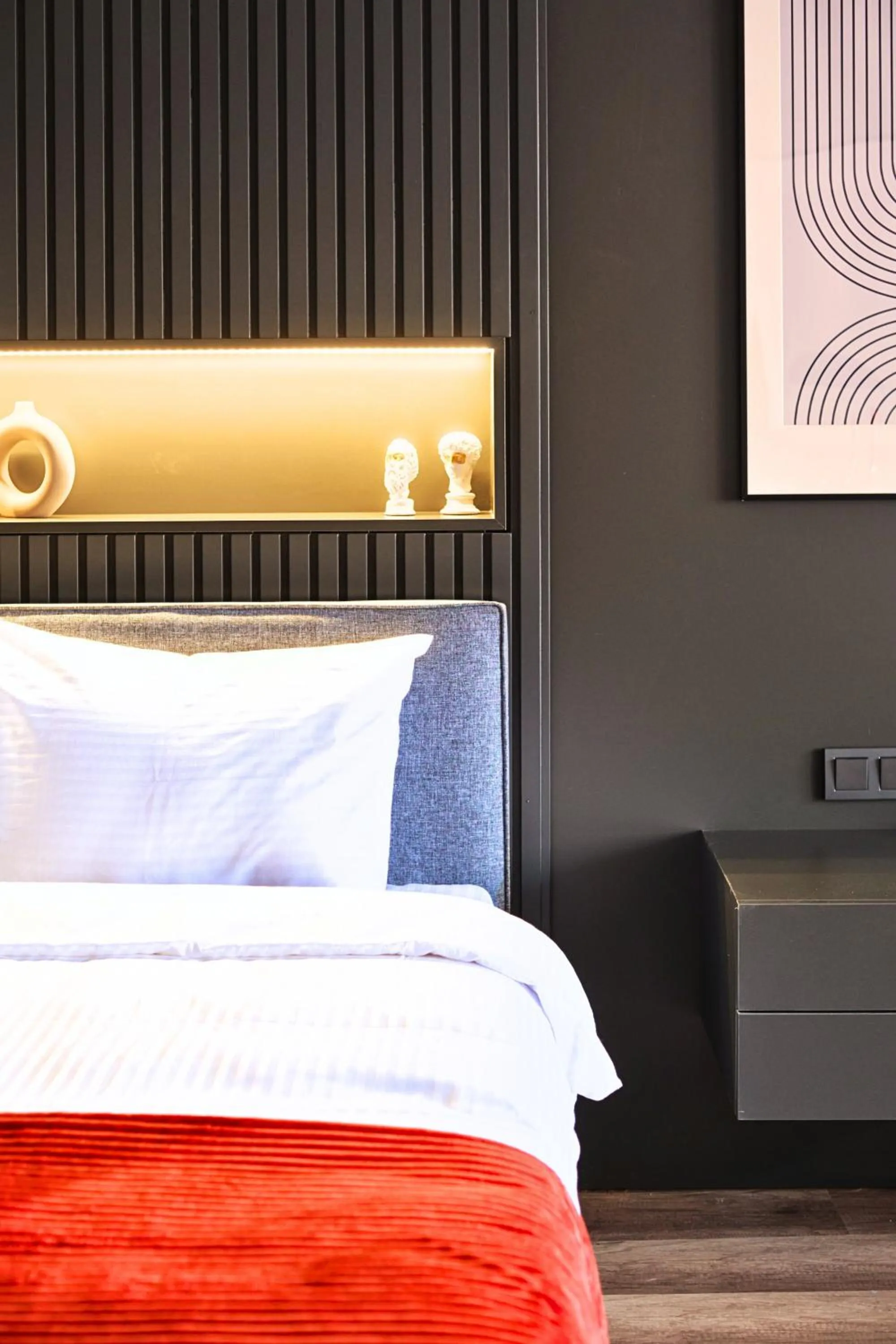 Bed in TAKS-INN Hotel