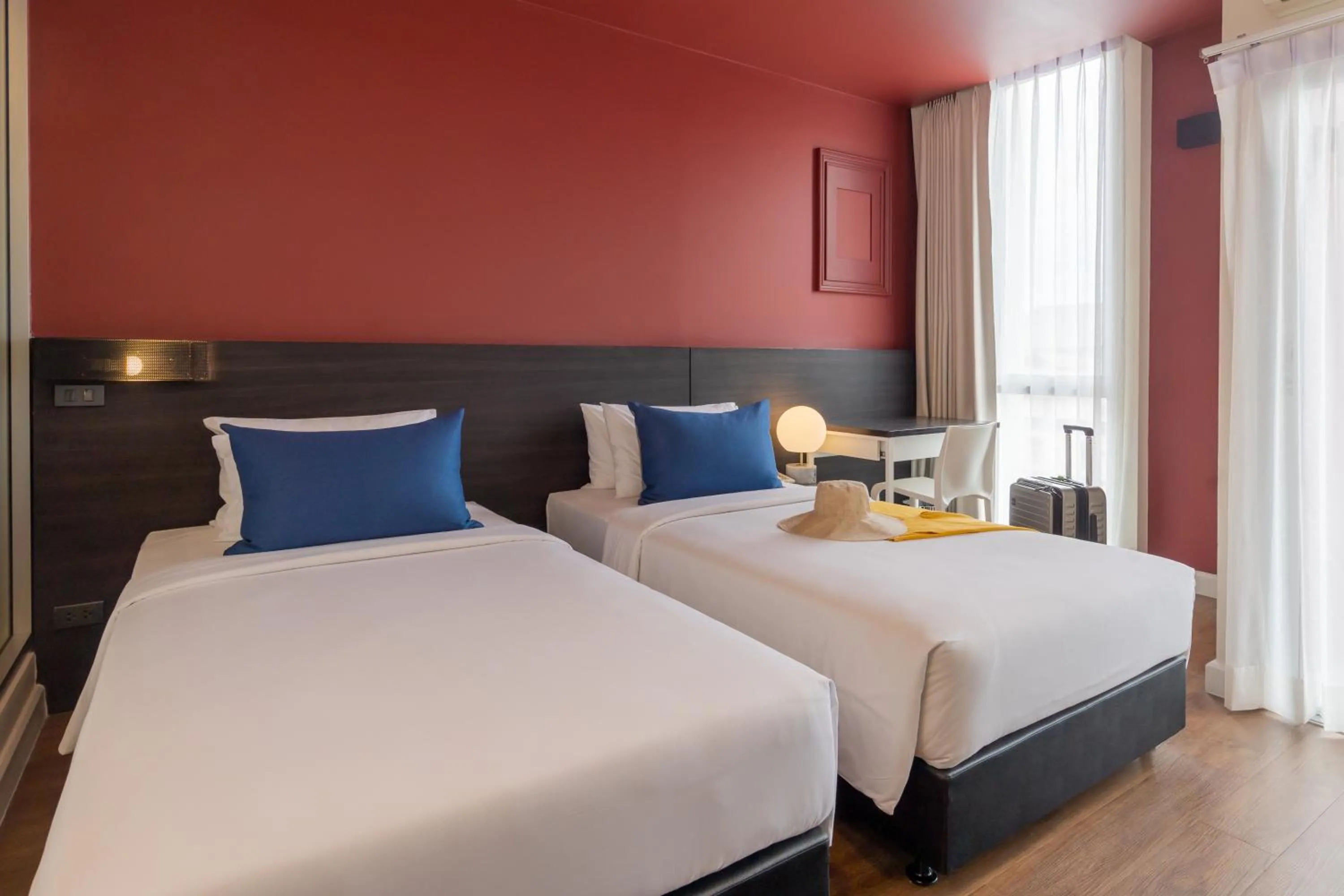 Bed in Blue Hippo Hotel