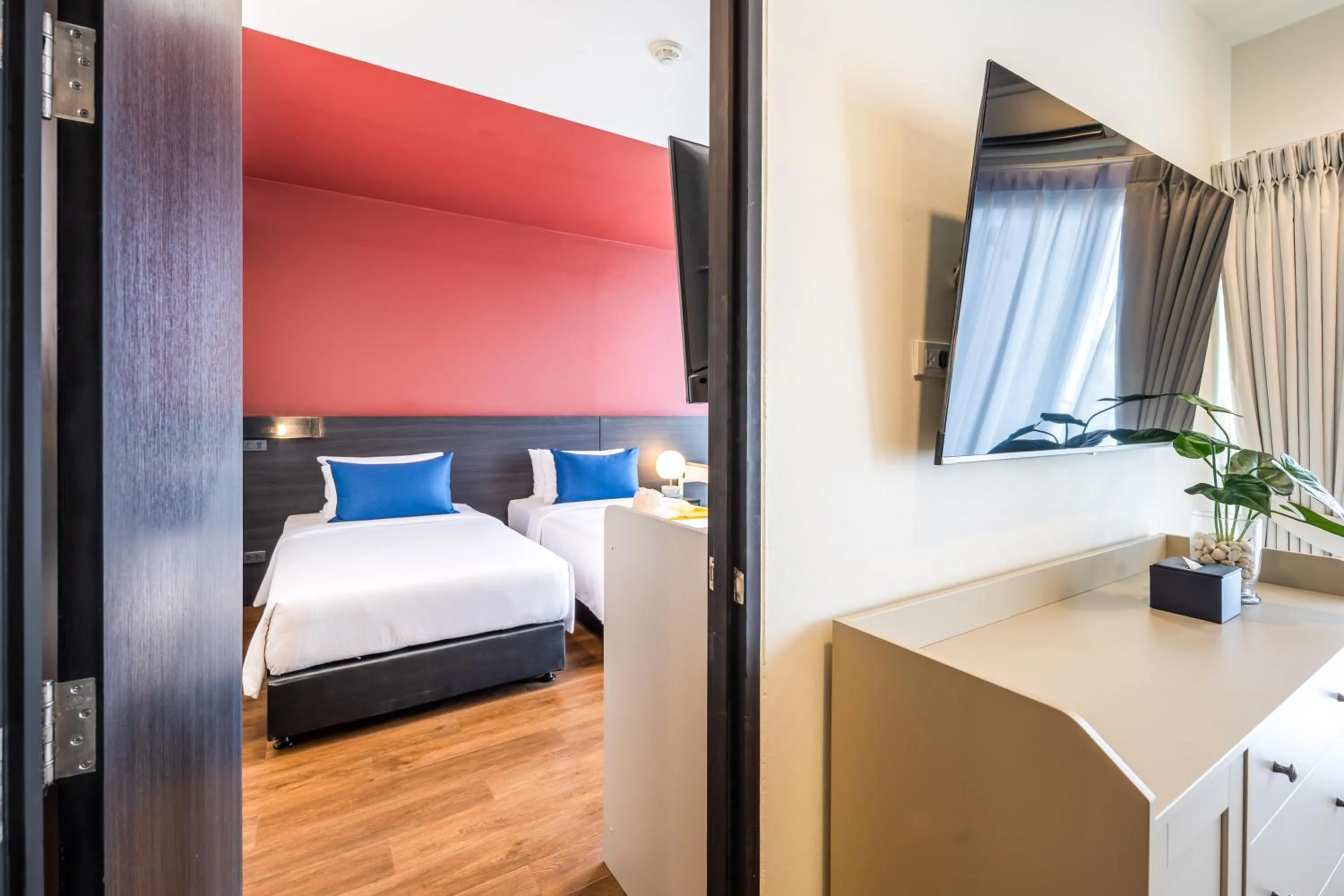 Bed in Blue Hippo Hotel