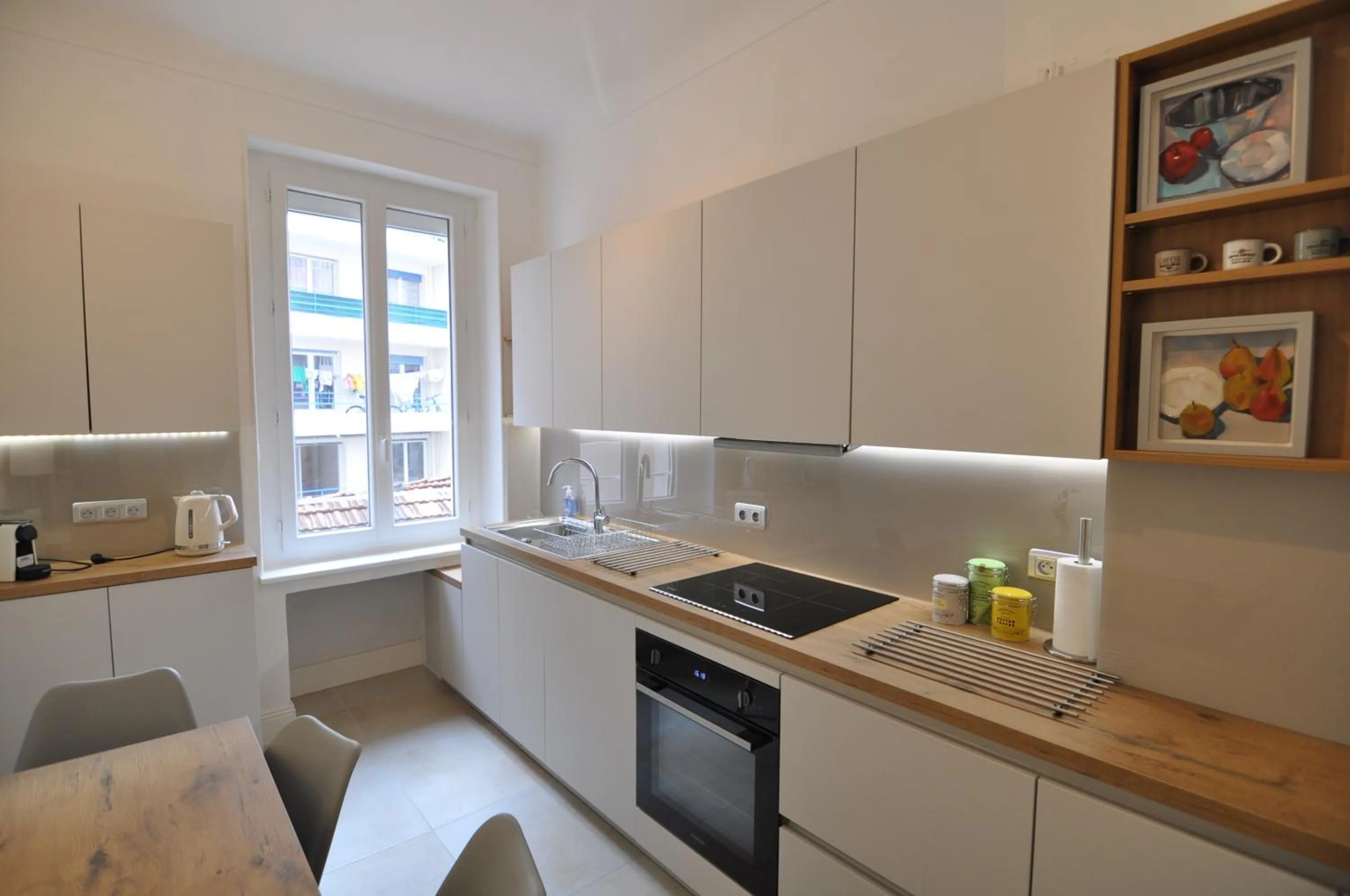Kitchen or kitchenette in Palais Albert -2-Bedroom Apartment -Ponteil Beach -StayInAntibes