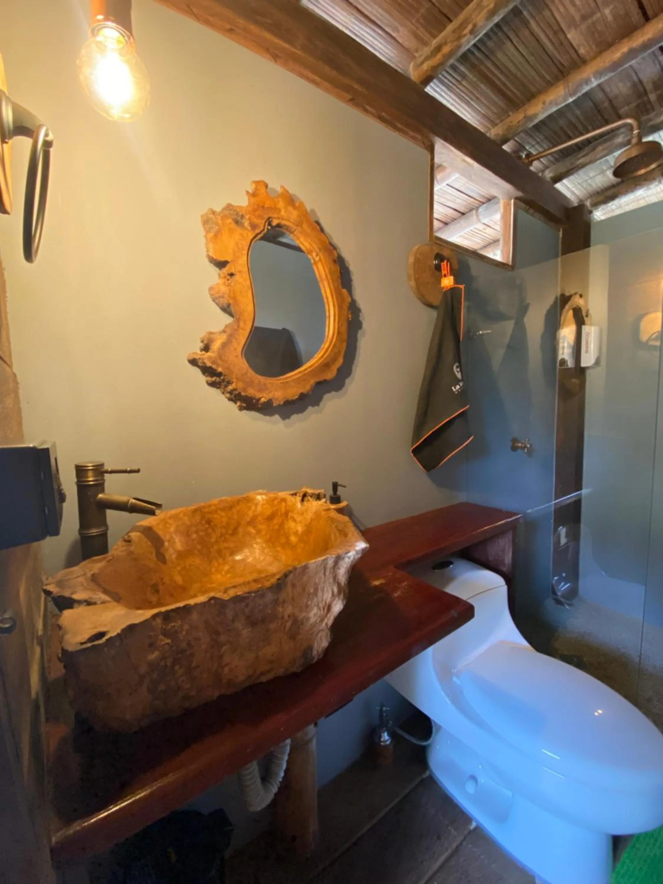 Bathroom, Bed in La Martina Ecolodge