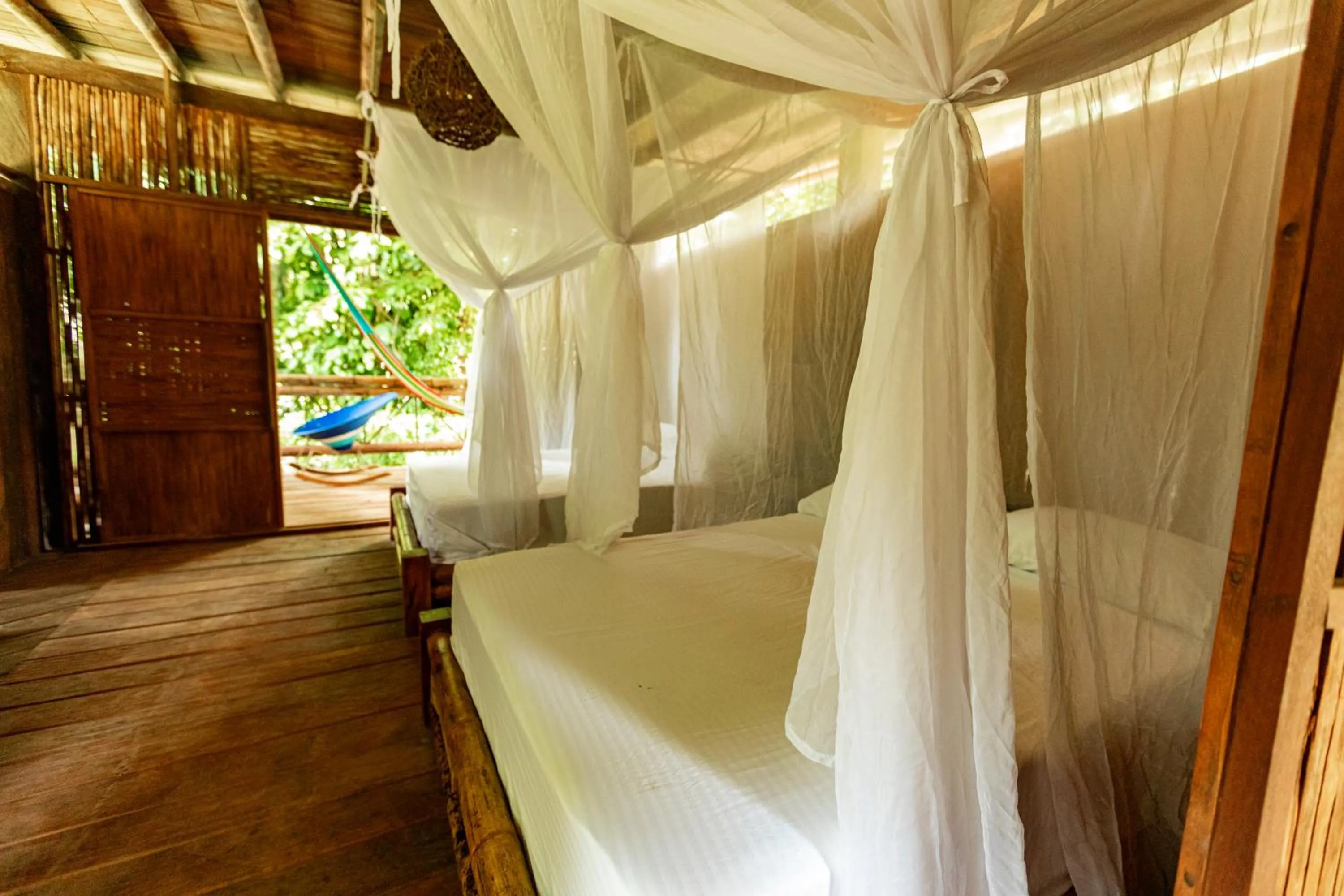 Bedroom in La Martina Ecolodge
