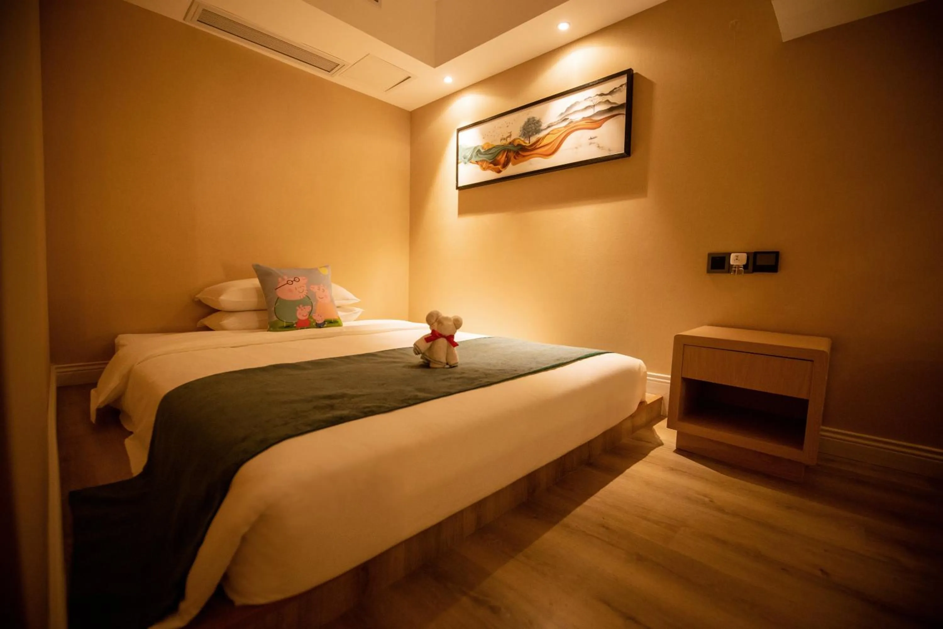 Bedroom in Hilmanhomeful Hotel - Caijia Subway Station
