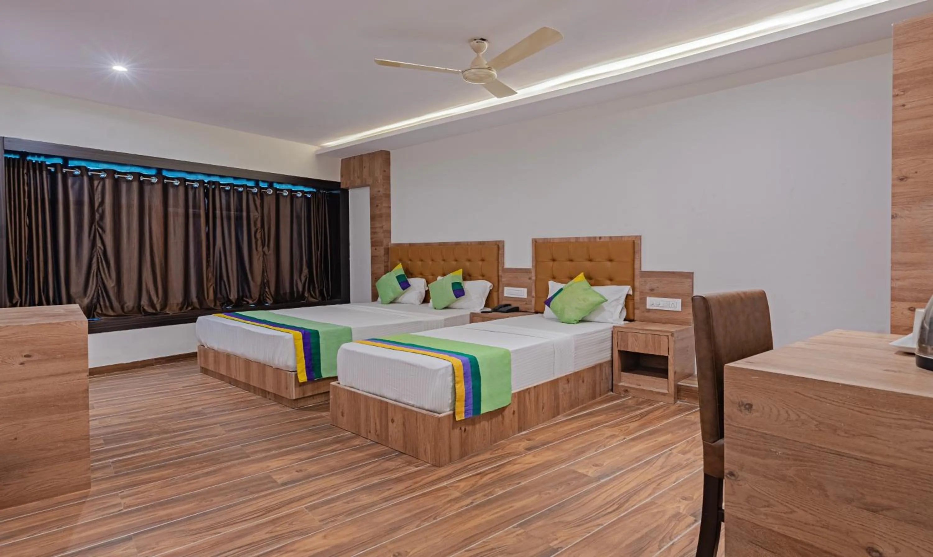 Photo of the whole room, Bed in Treebo Seven Olives