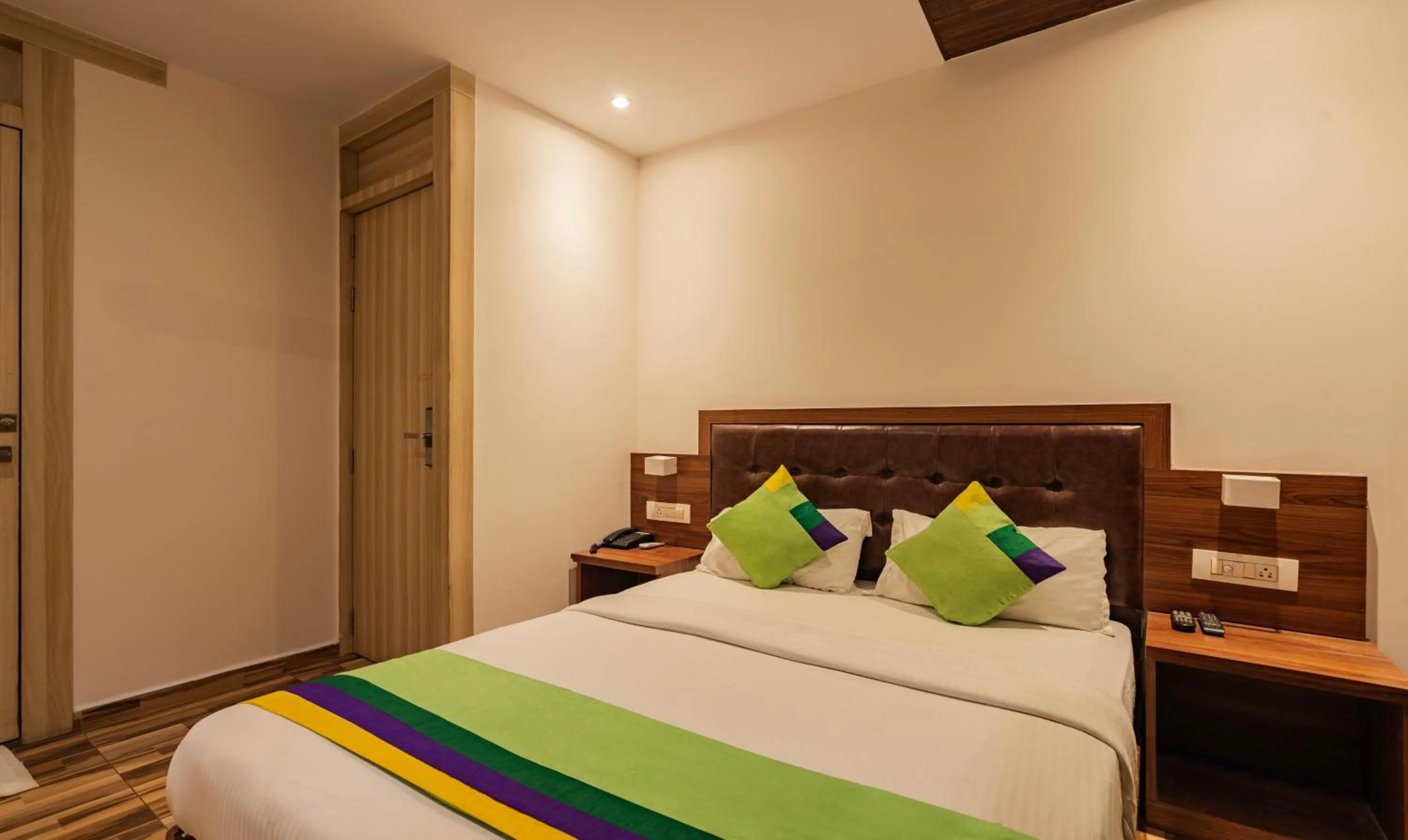 Bedroom, Bed in Treebo Seven Olives