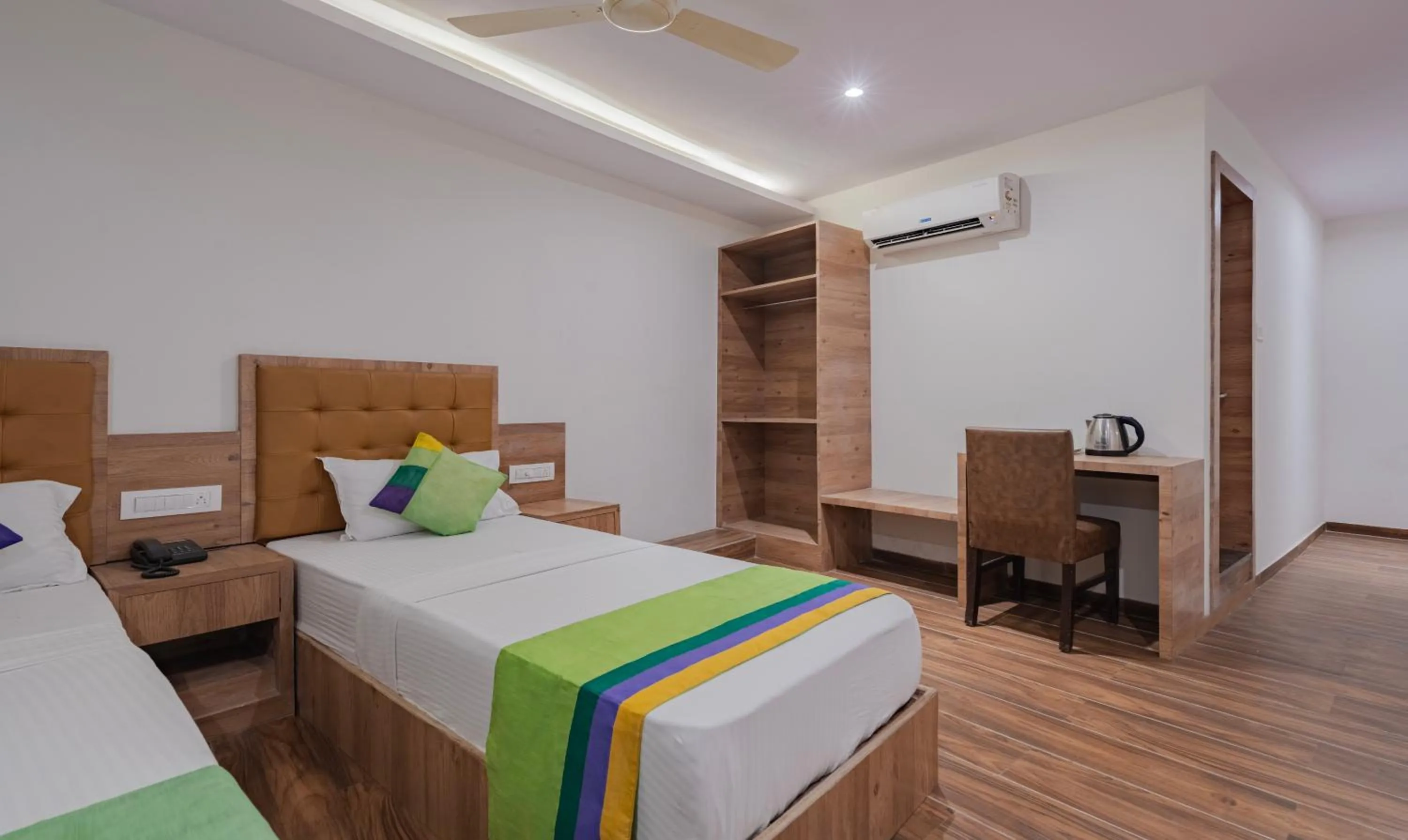 Bedroom, Bed in Treebo Seven Olives