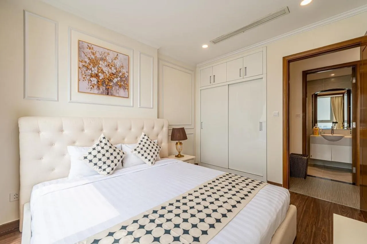 Bed in Elvita Landmark Luxury Residence