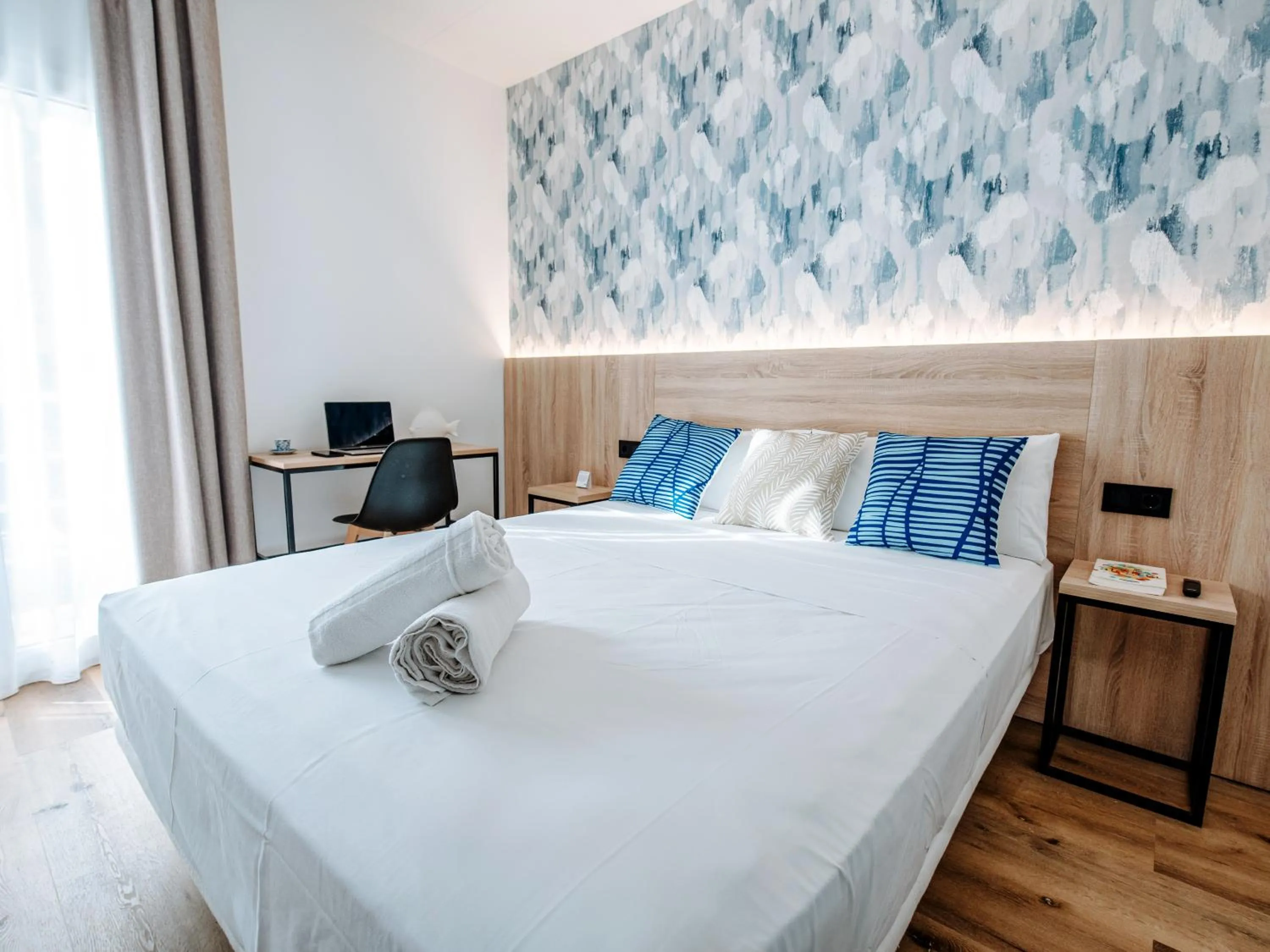 Bed in Sweet Lloret Suites