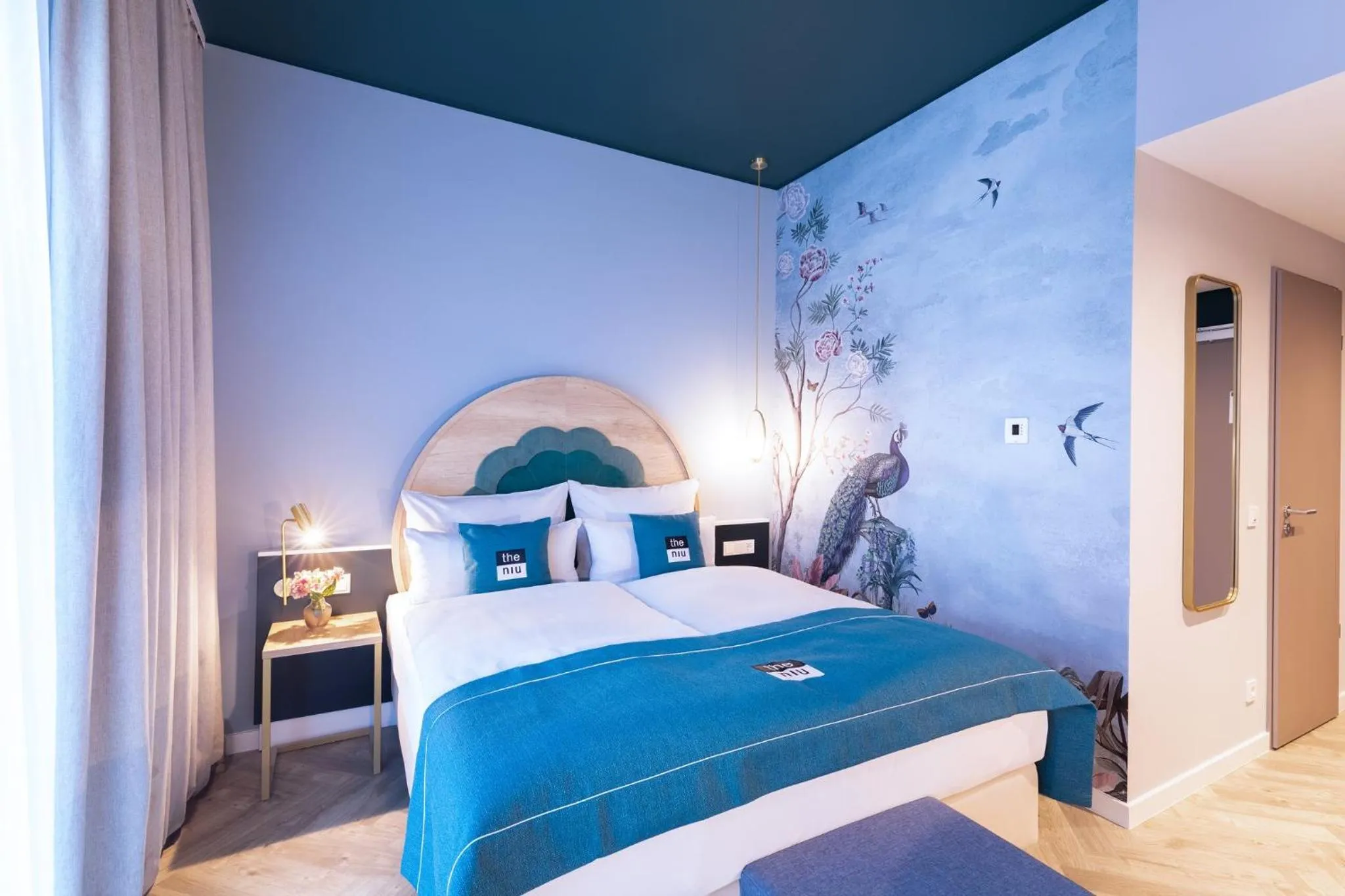 Photo of the whole room, Bed in Holiday Inn - the niu, Flower Konstanz by IHG