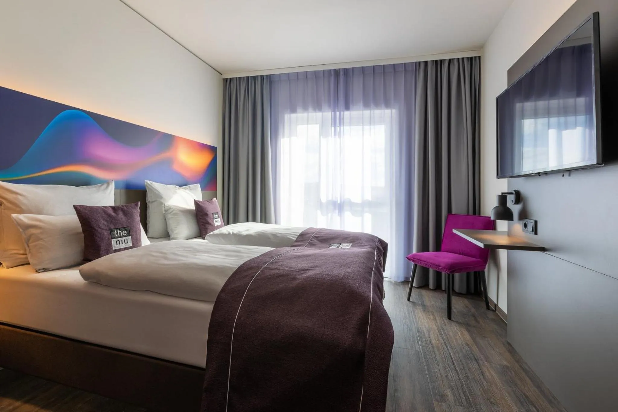 Photo of the whole room, Bed in Holiday Inn-the niu, Wave Karlsruhe Oststadt by IHG