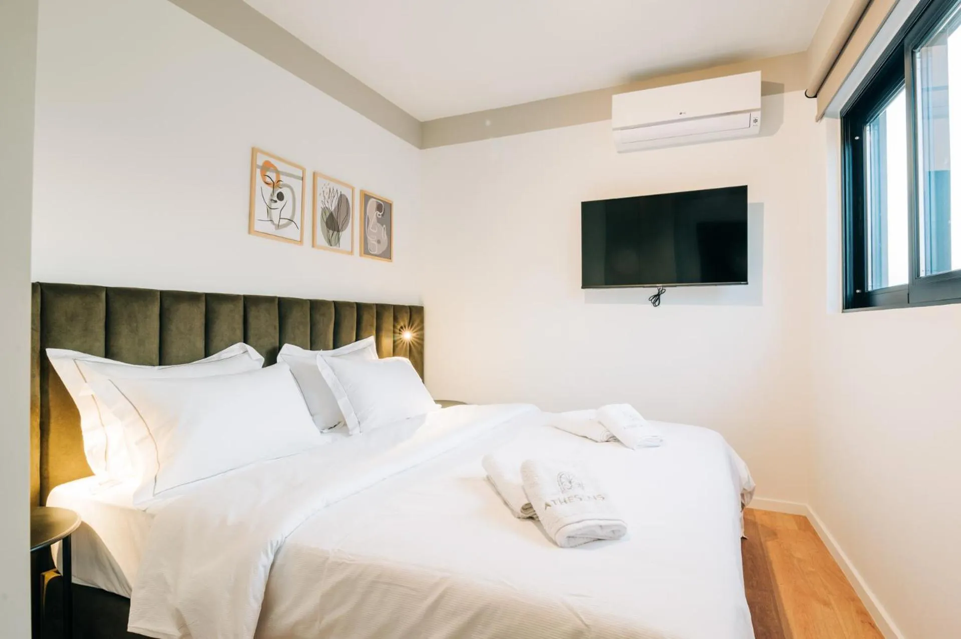 Bed in Athesense Suites