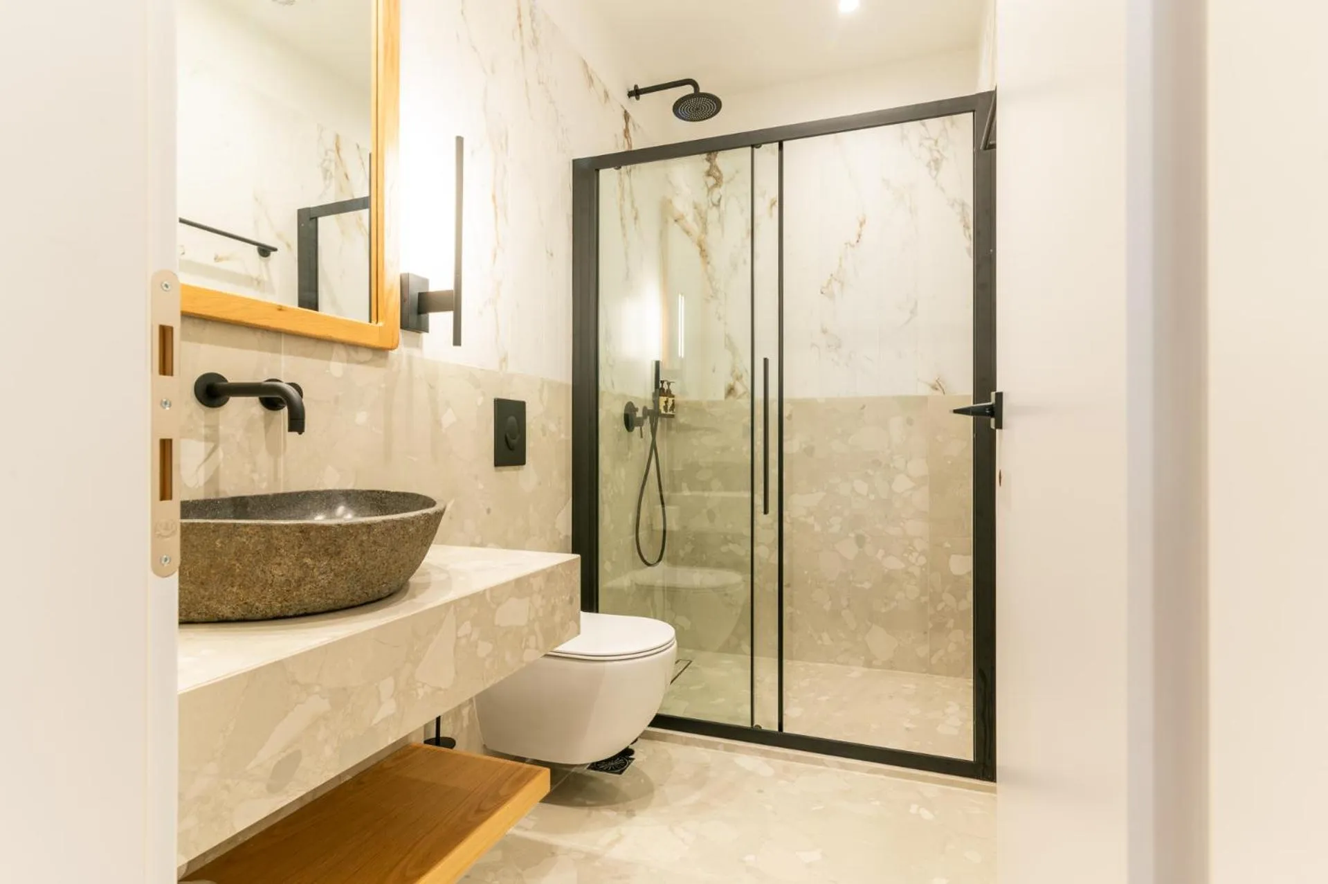 Shower in Athesense Suites