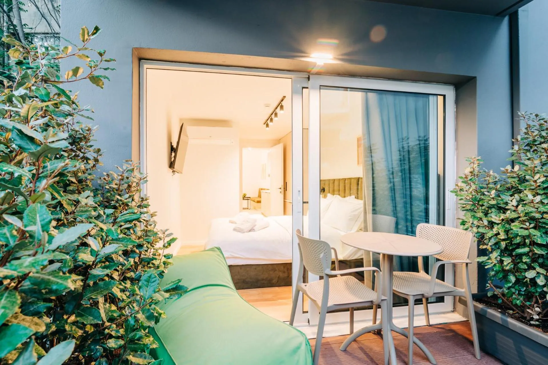 Balcony/Terrace, Bed in Athesense Suites