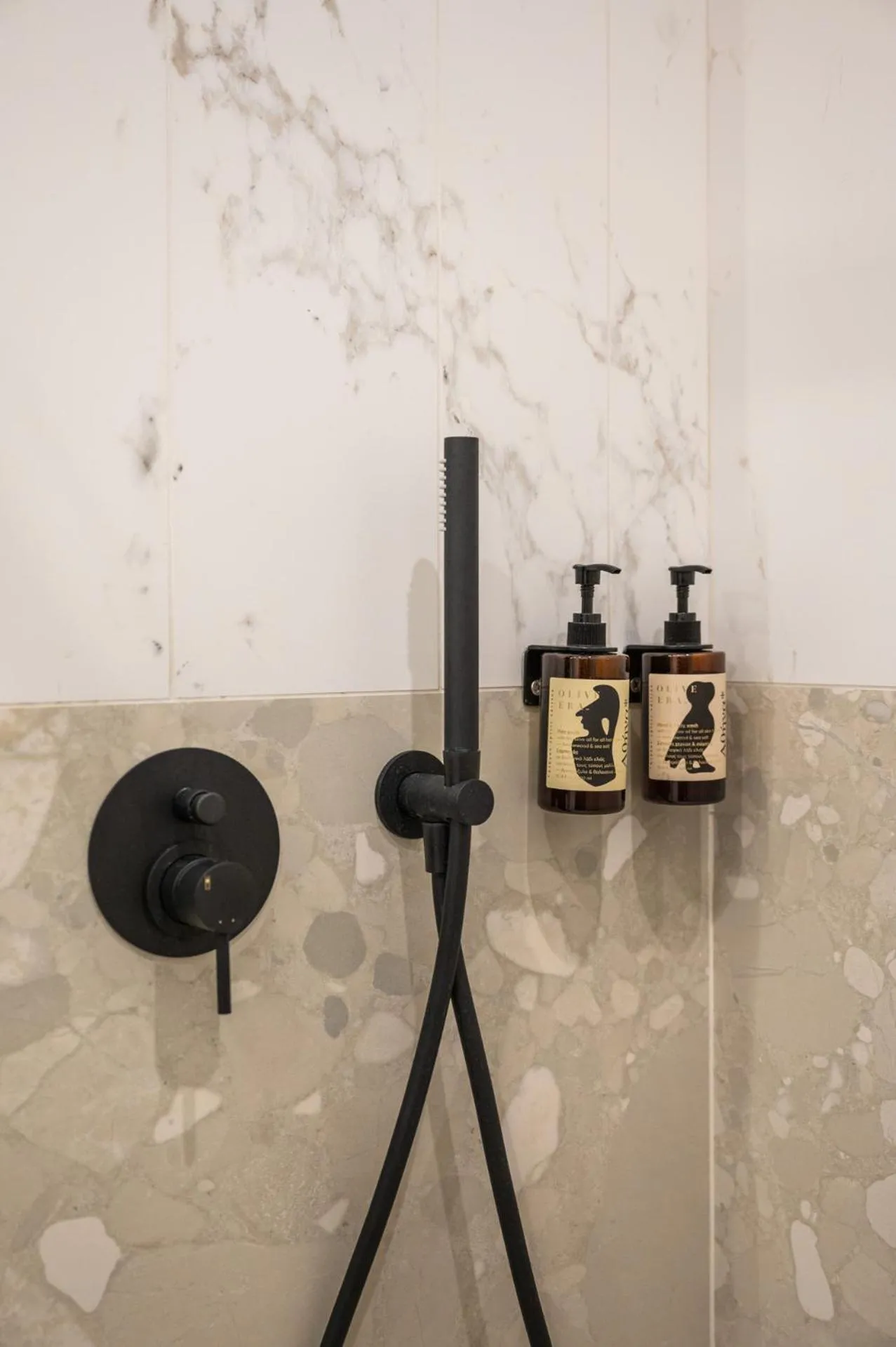 Shower in Athesense Suites