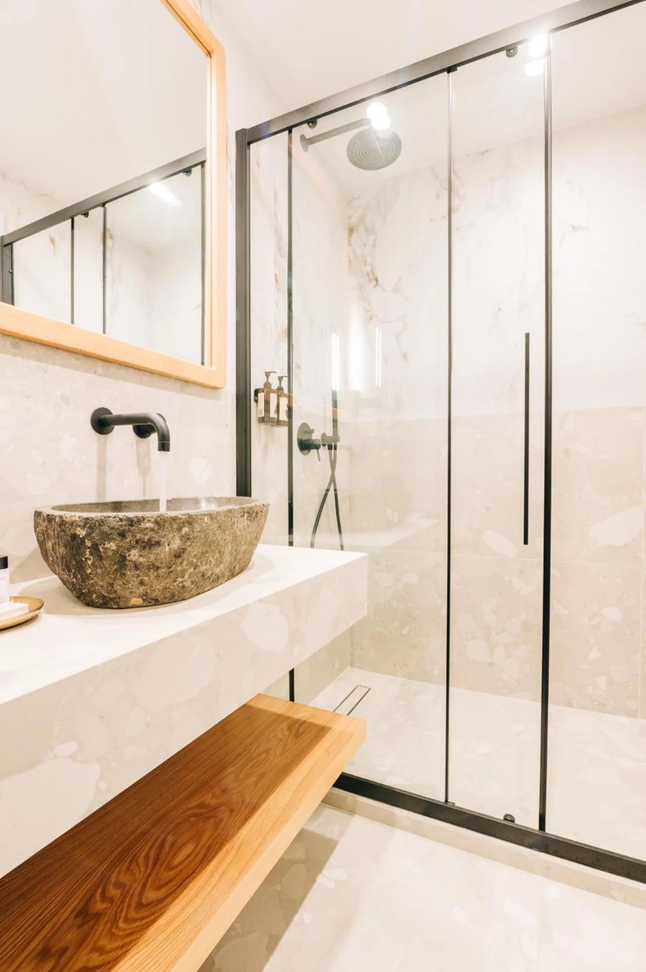 Shower in Athesense Suites