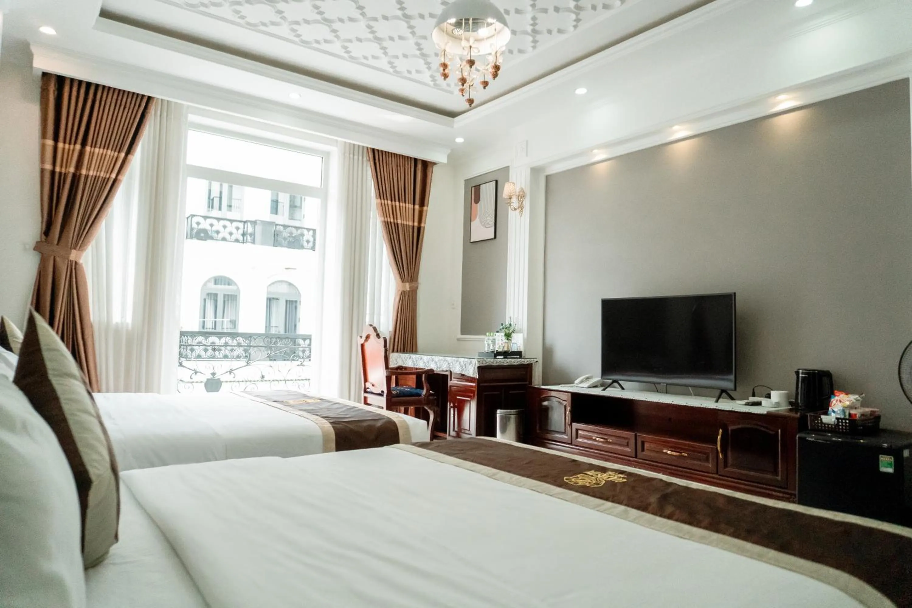 Bed in Lucasta Hotel